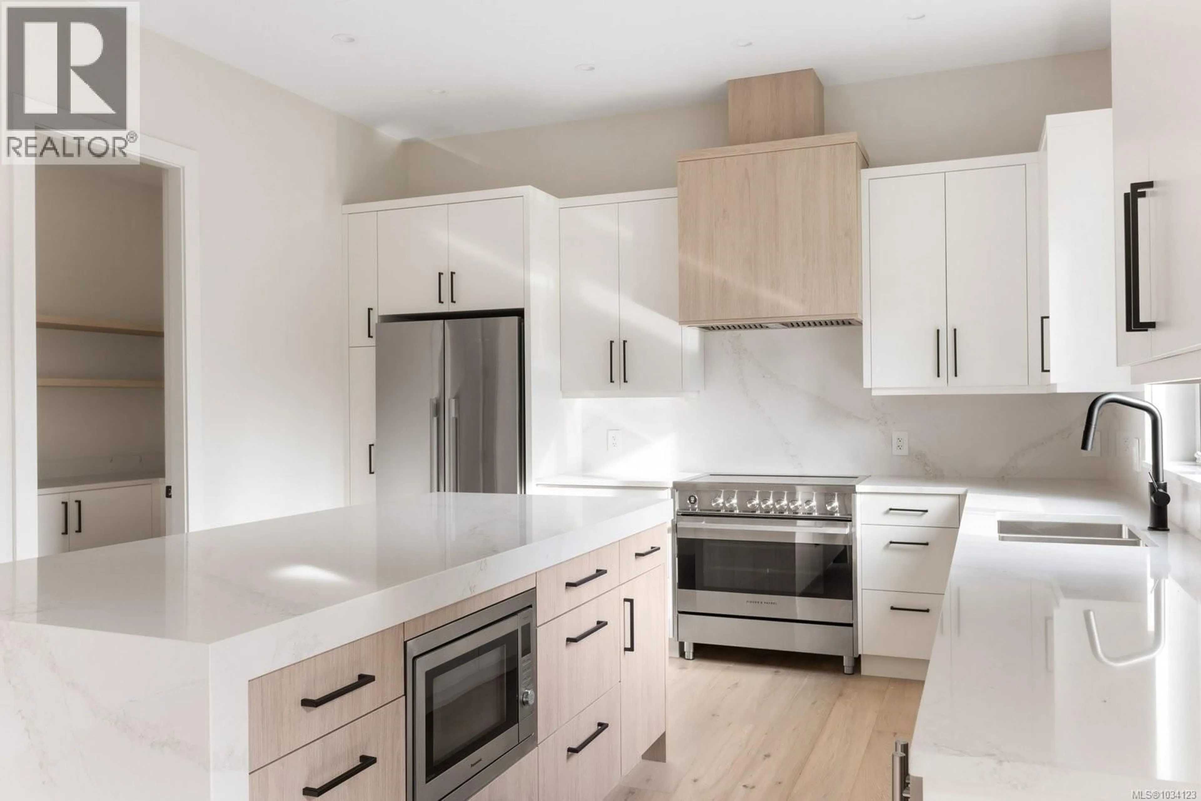 Contemporary kitchen, wood/laminate floor for 2295 ADELA PLACE, Sidney British Columbia V8L1R2