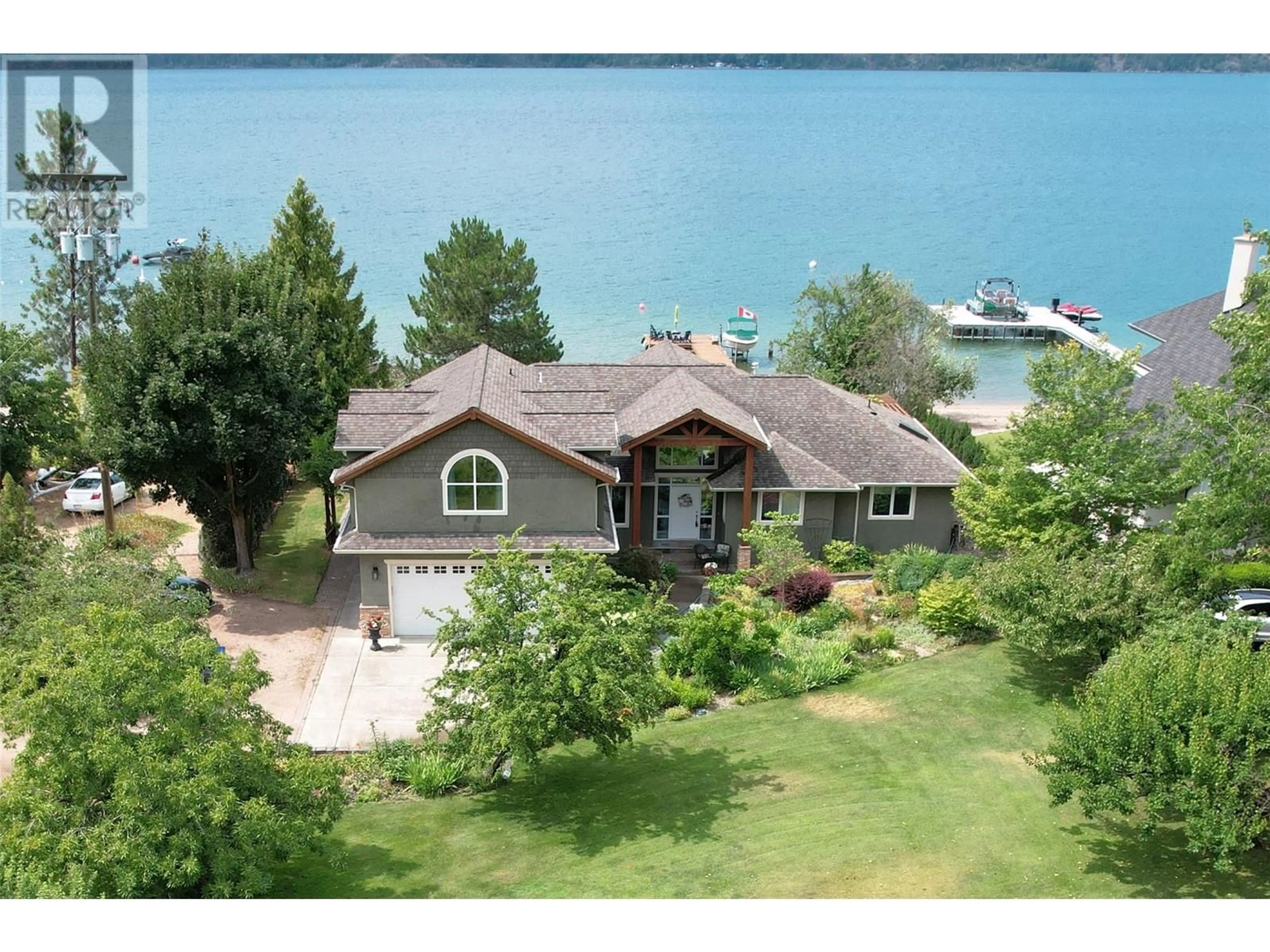 A pic from outside/outdoor area/front of a property/back of a property/a pic from drone, water/lake/river/ocean view for 15714 WHISKEY COVE ROAD, Lake Country British Columbia V4V1C4