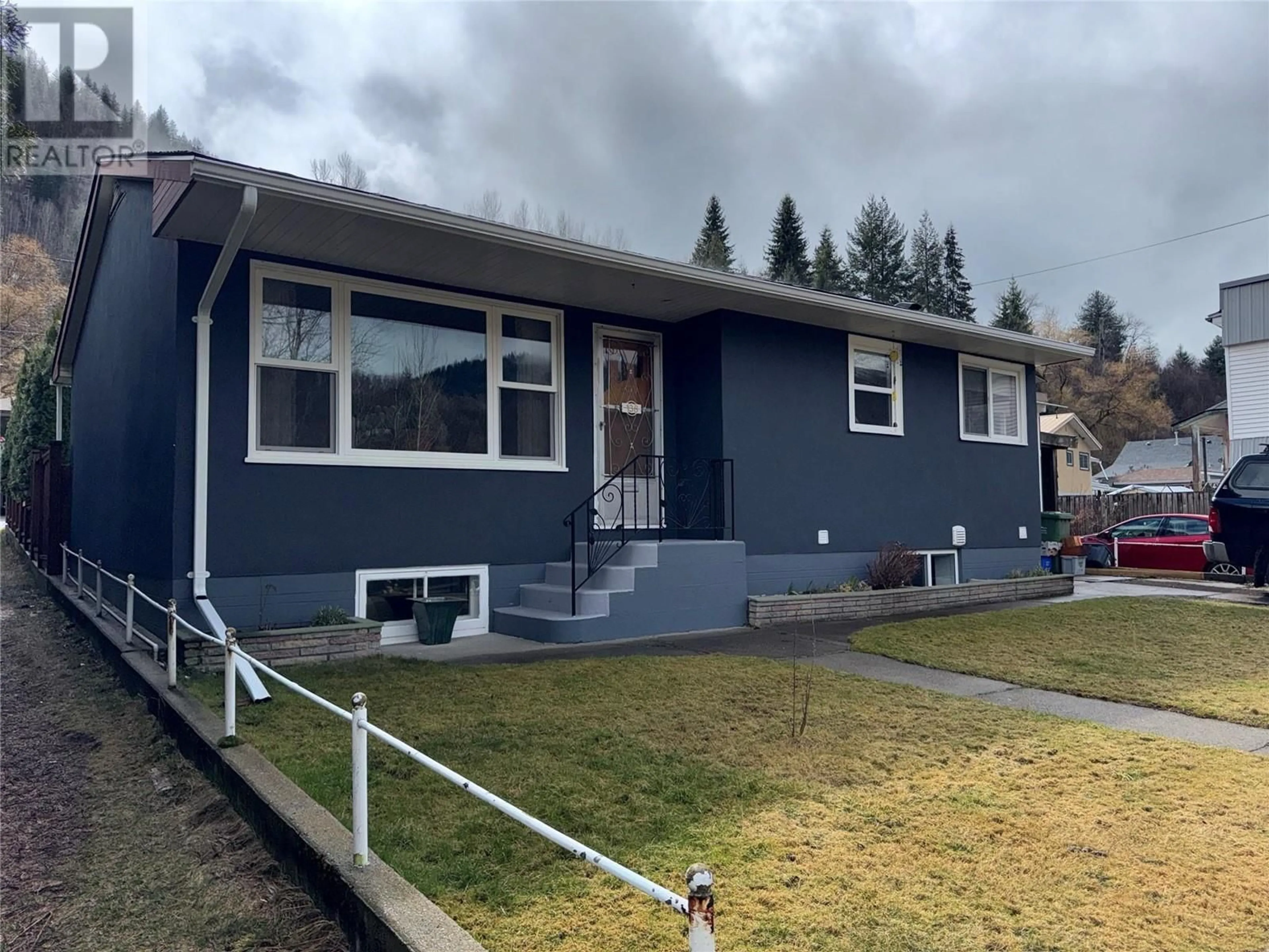 Home with vinyl exterior material, street for 138 HAIG STREET, Warfield British Columbia V1R2L9