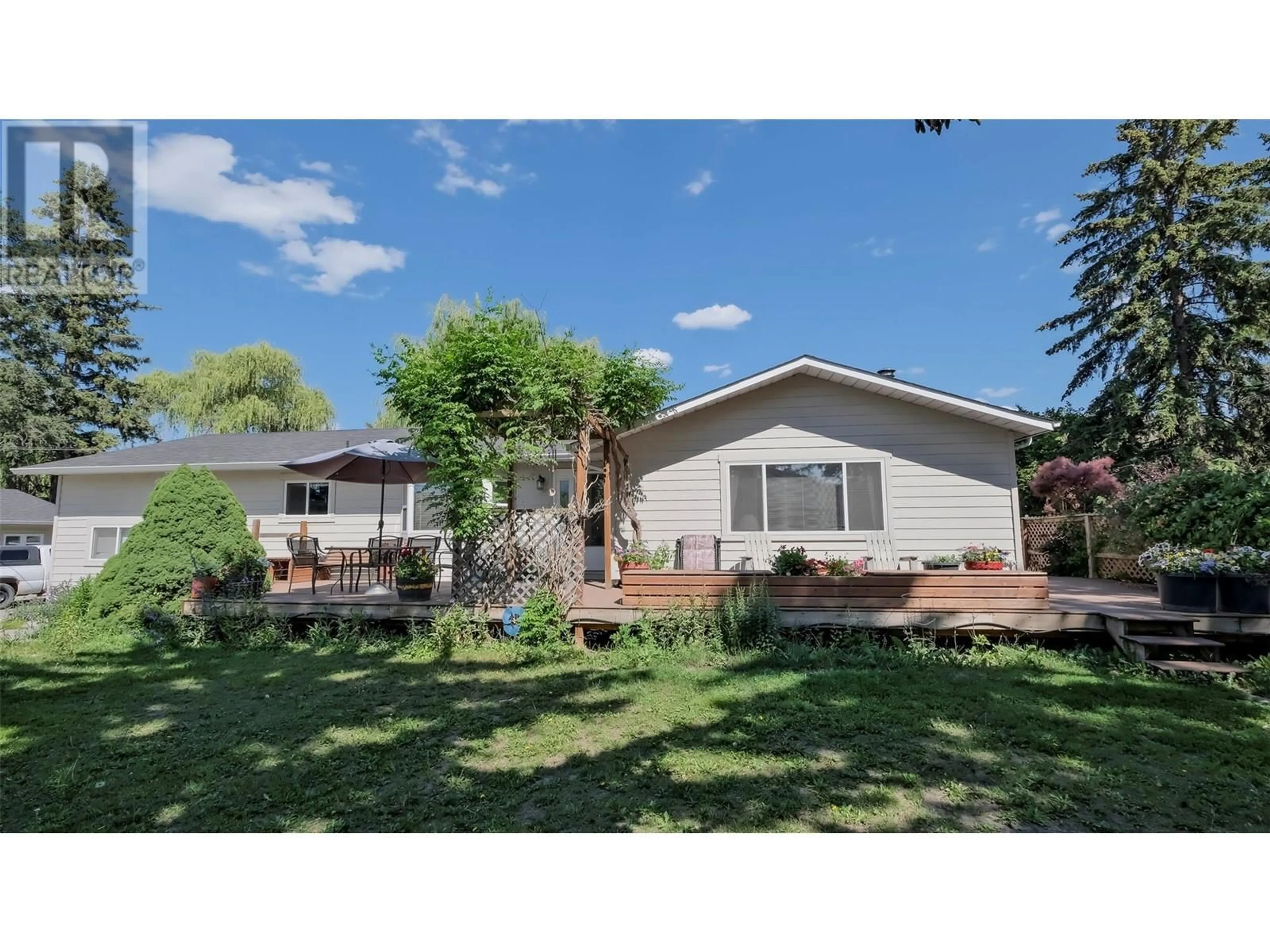 A pic from outside/outdoor area/front of a property/back of a property/a pic from drone, street for 11375 REISWIG ROAD, Lake Country British Columbia V4V1Y5