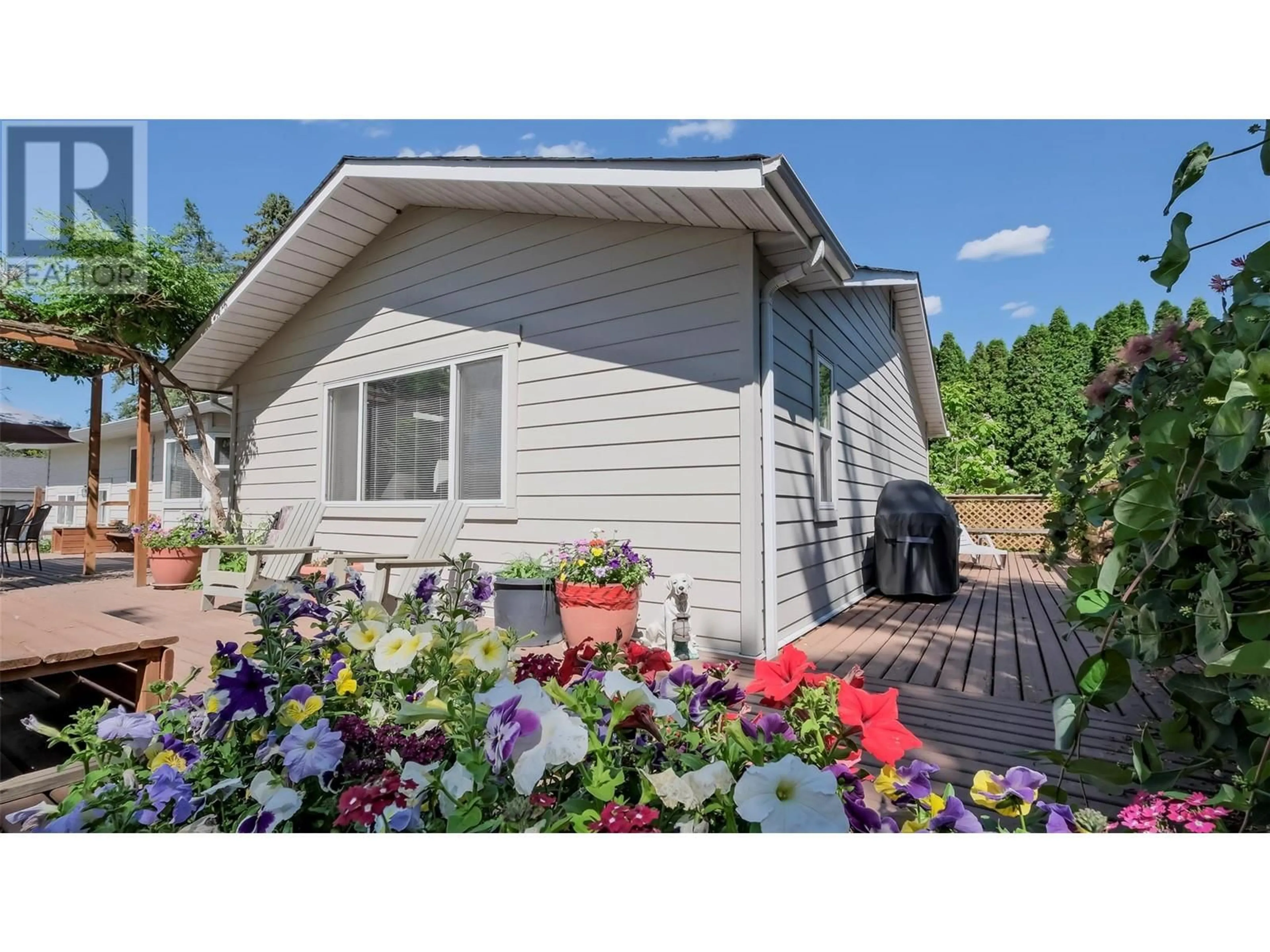 Home with vinyl exterior material, street for 11375 REISWIG ROAD, Lake Country British Columbia V4V1Y5