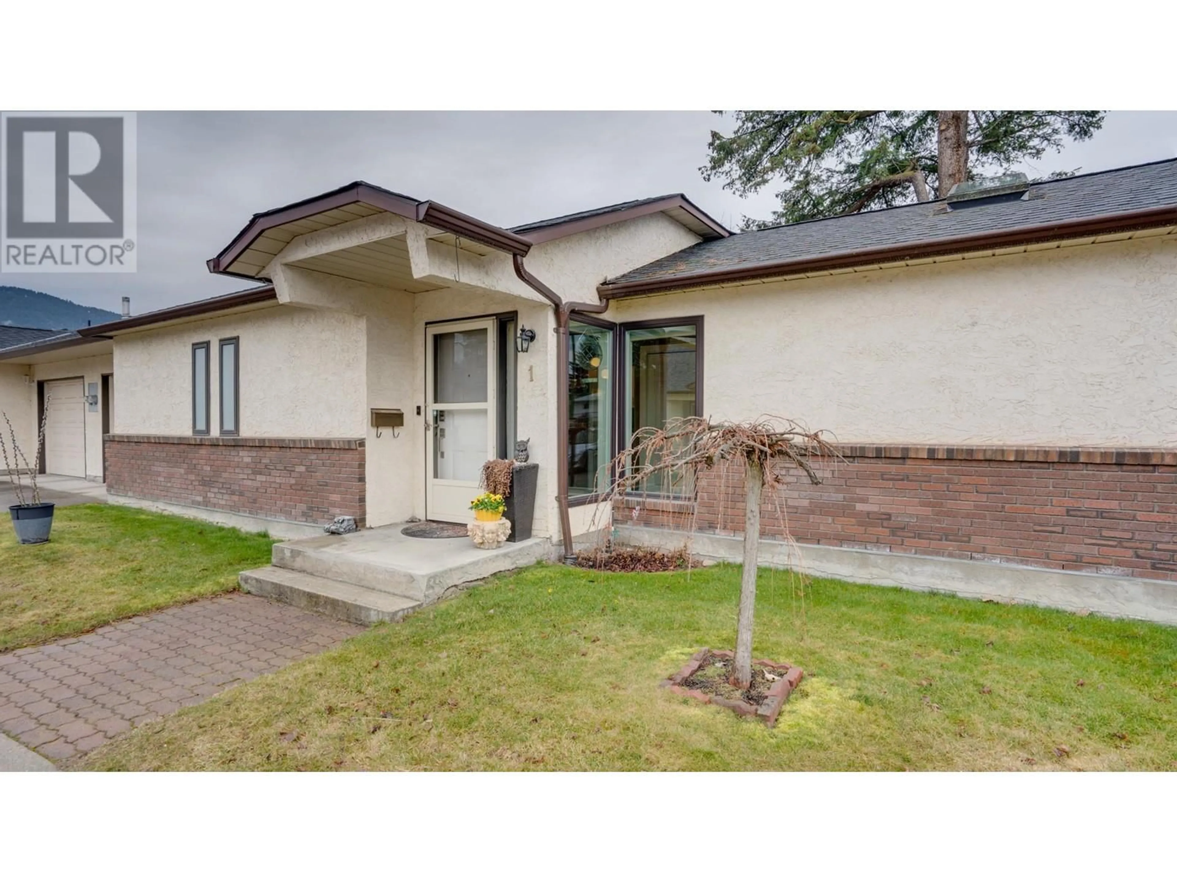 Home with brick exterior material, street for 1 - 4311 20 STREET, Vernon British Columbia V1T4E4