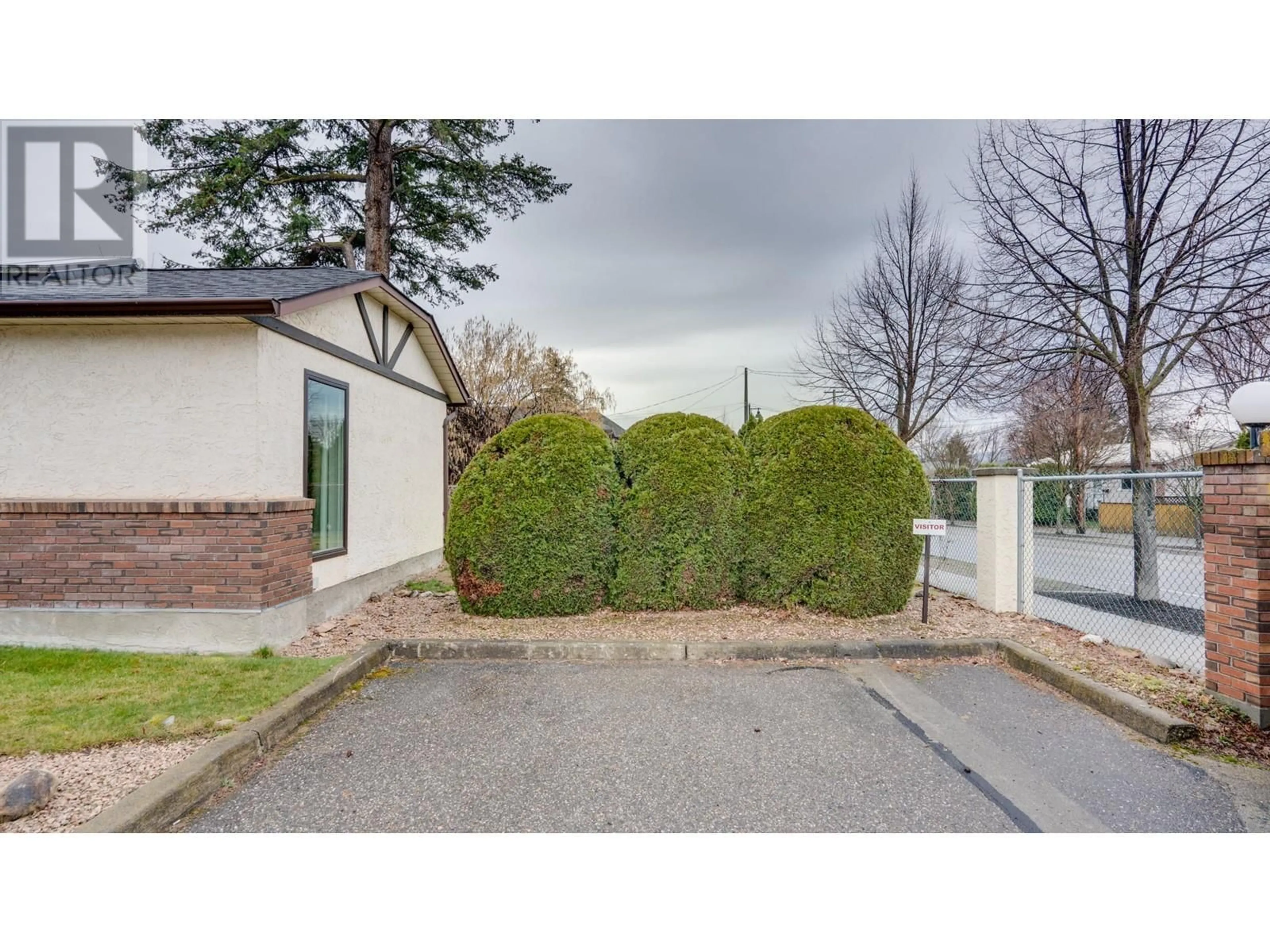 A pic from outside/outdoor area/front of a property/back of a property/a pic from drone, street for 1 - 4311 20 STREET, Vernon British Columbia V1T4E4