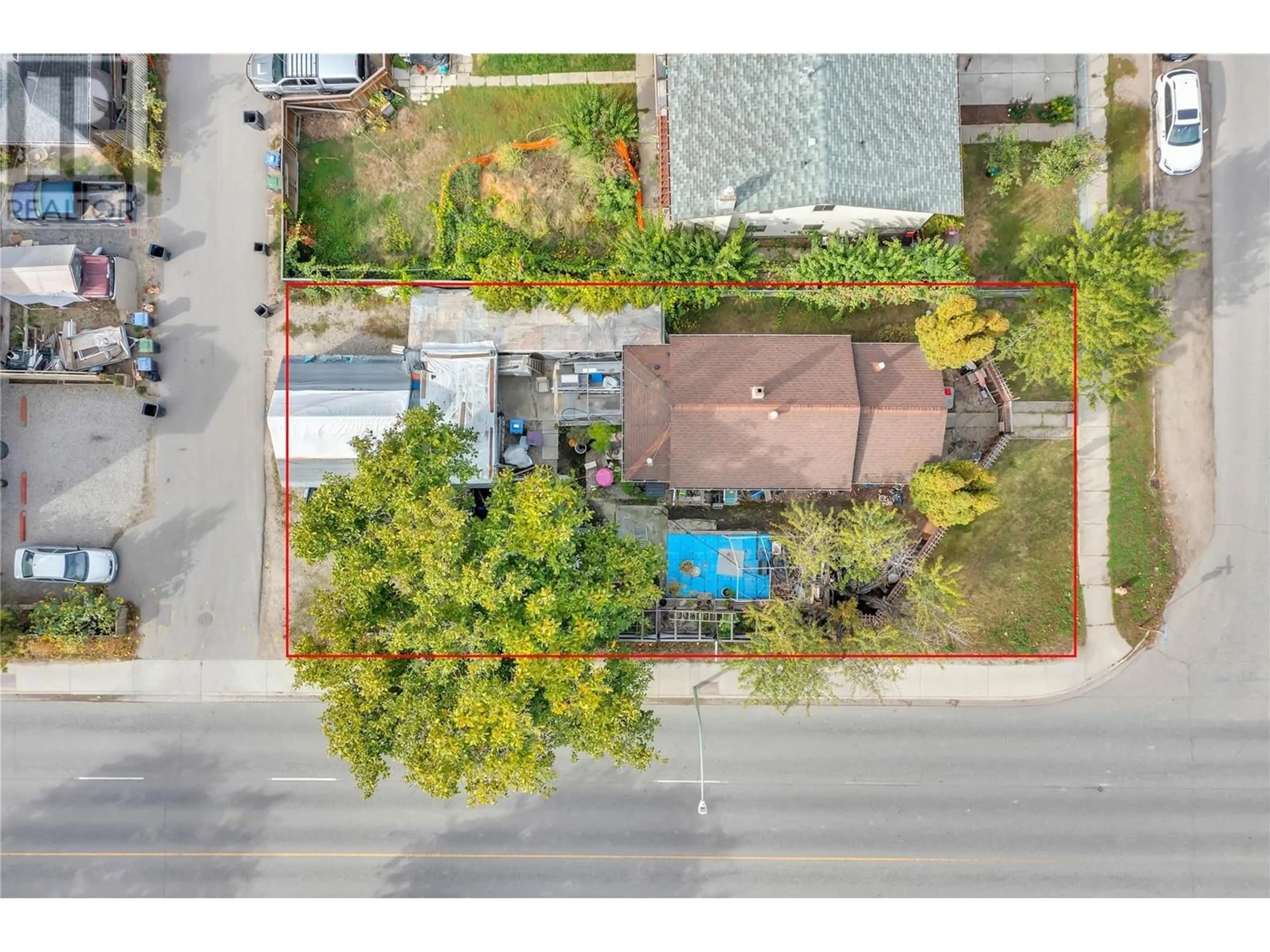 A pic from outside/outdoor area/front of a property/back of a property/a pic from drone, street for 1099 STOCKWELL AVENUE, Kelowna British Columbia V1Y6W4