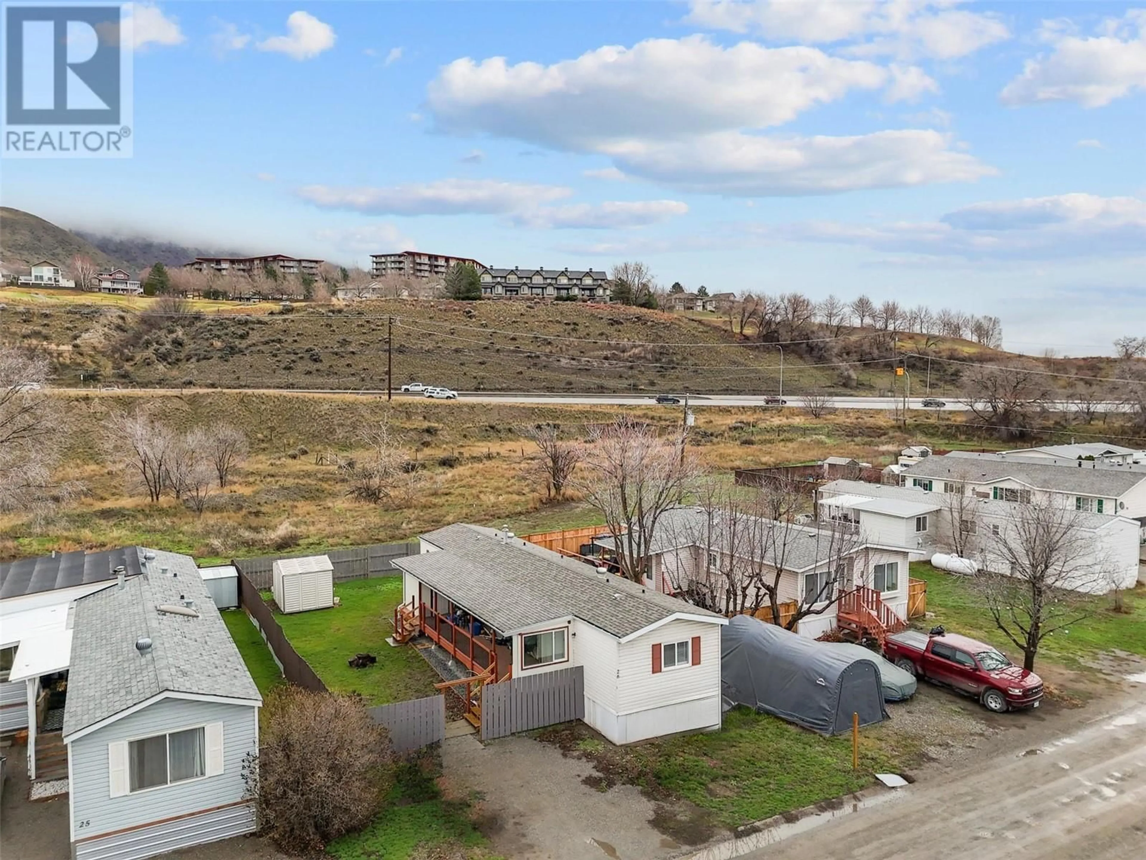 A pic from outside/outdoor area/front of a property/back of a property/a pic from drone, street for 26 - 240 G & M ROAD, Kamloops British Columbia V2H1P8