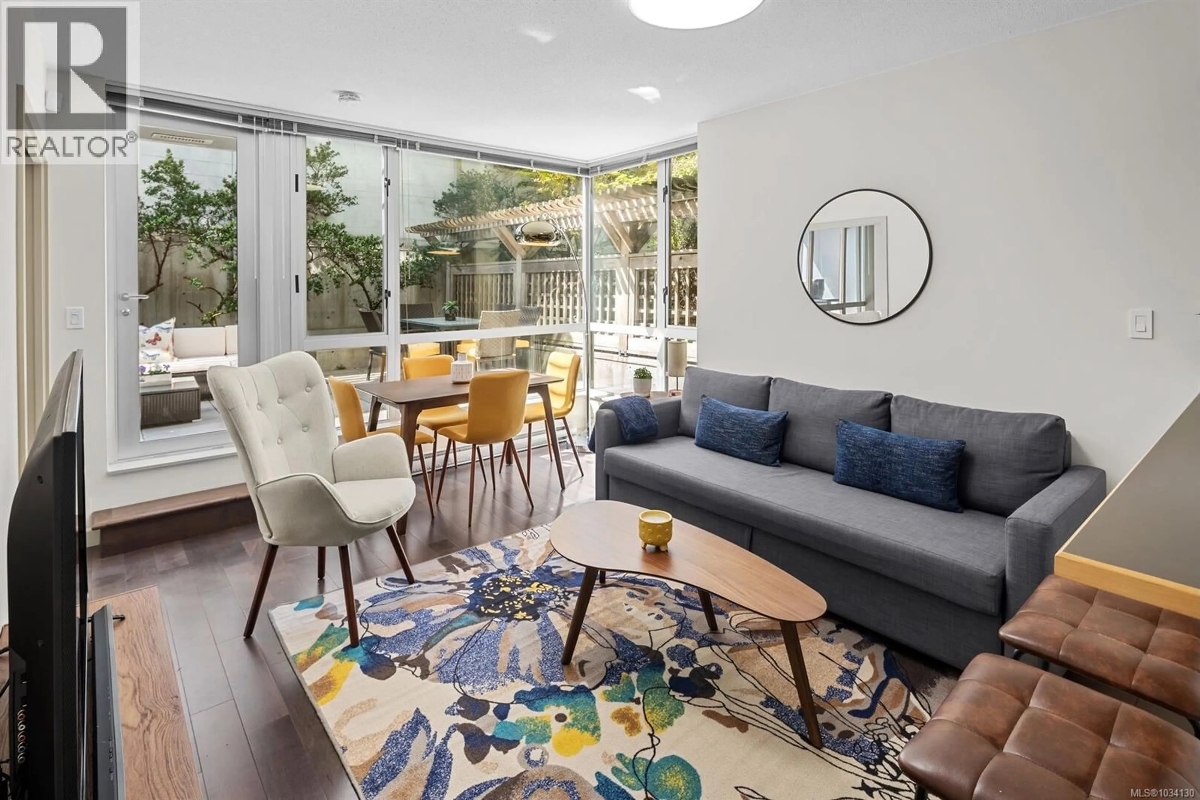 Living room with furniture, unknown for 201 - 732 CORMORANT STREET, Victoria British Columbia V8W1P8