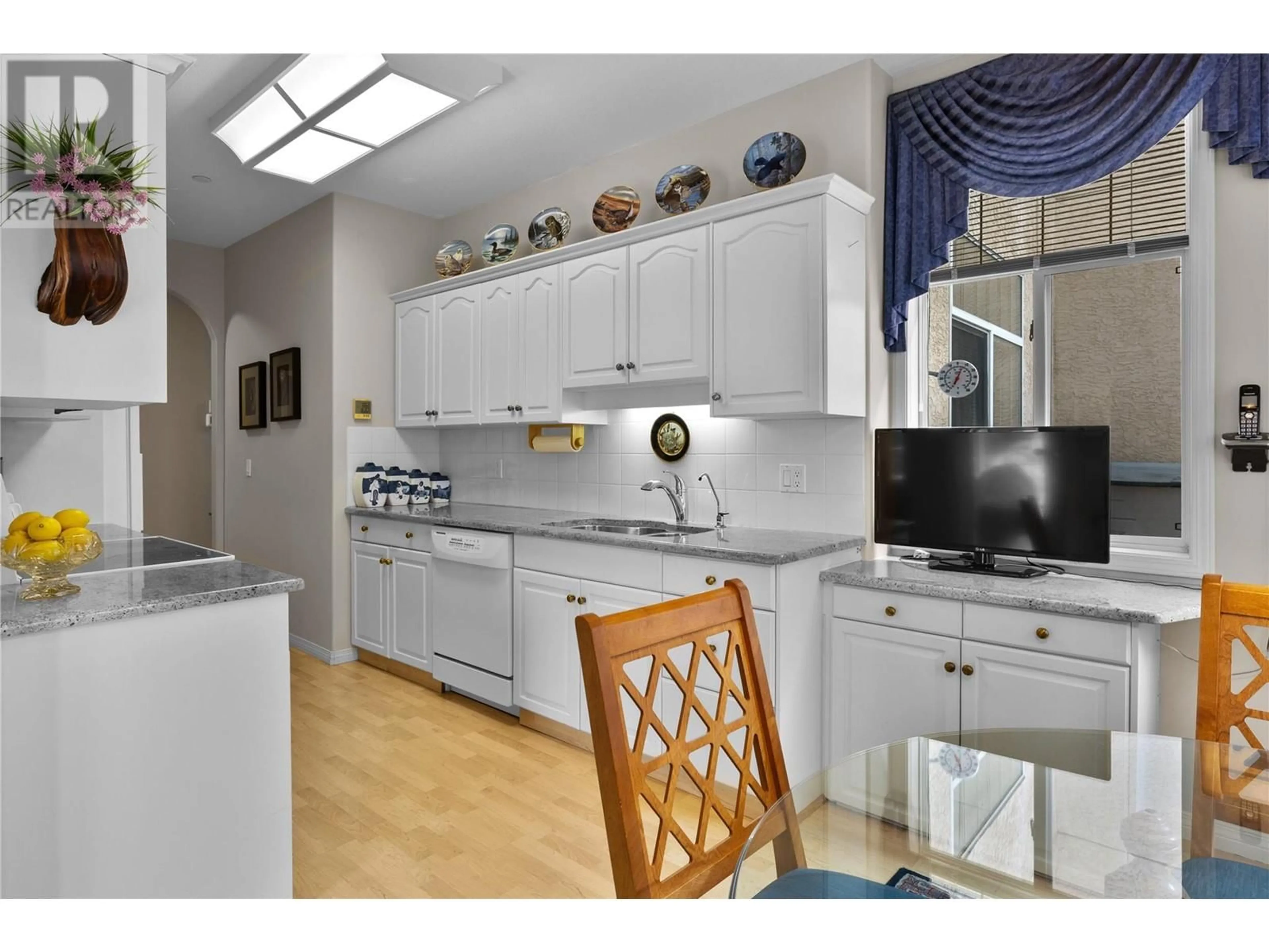 Standard kitchen, ceramic/tile floor for 210 - 634 LEQUIME ROAD, Kelowna British Columbia V1W1A4