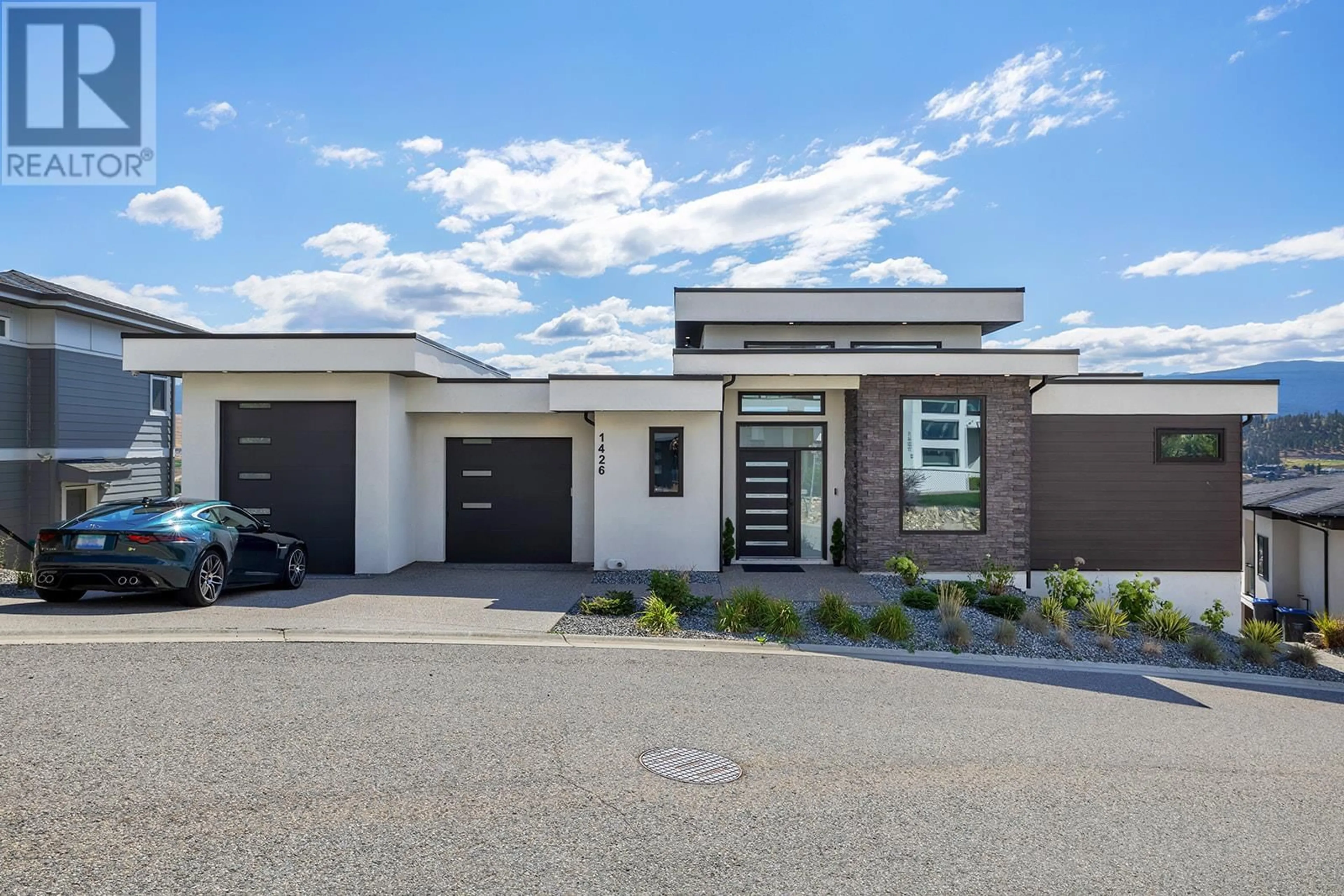Home with brick exterior material, street for 1426 MINE HILL LANE, Kelowna British Columbia V1P1T6