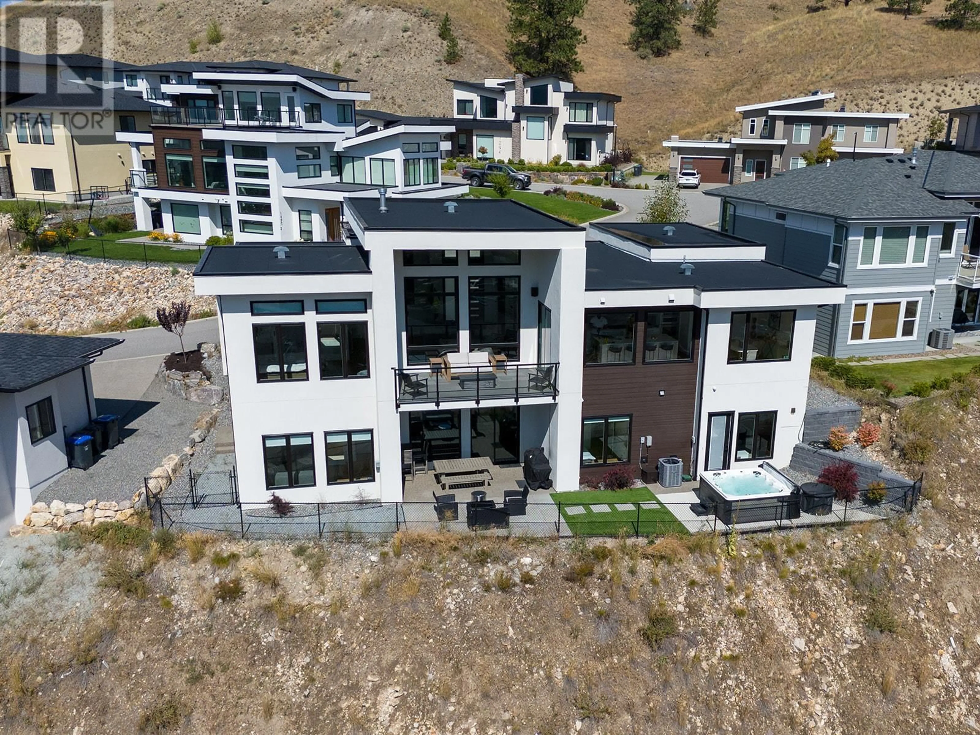 A pic from outside/outdoor area/front of a property/back of a property/a pic from drone, mountain view for 1426 MINE HILL LANE, Kelowna British Columbia V1P1T6