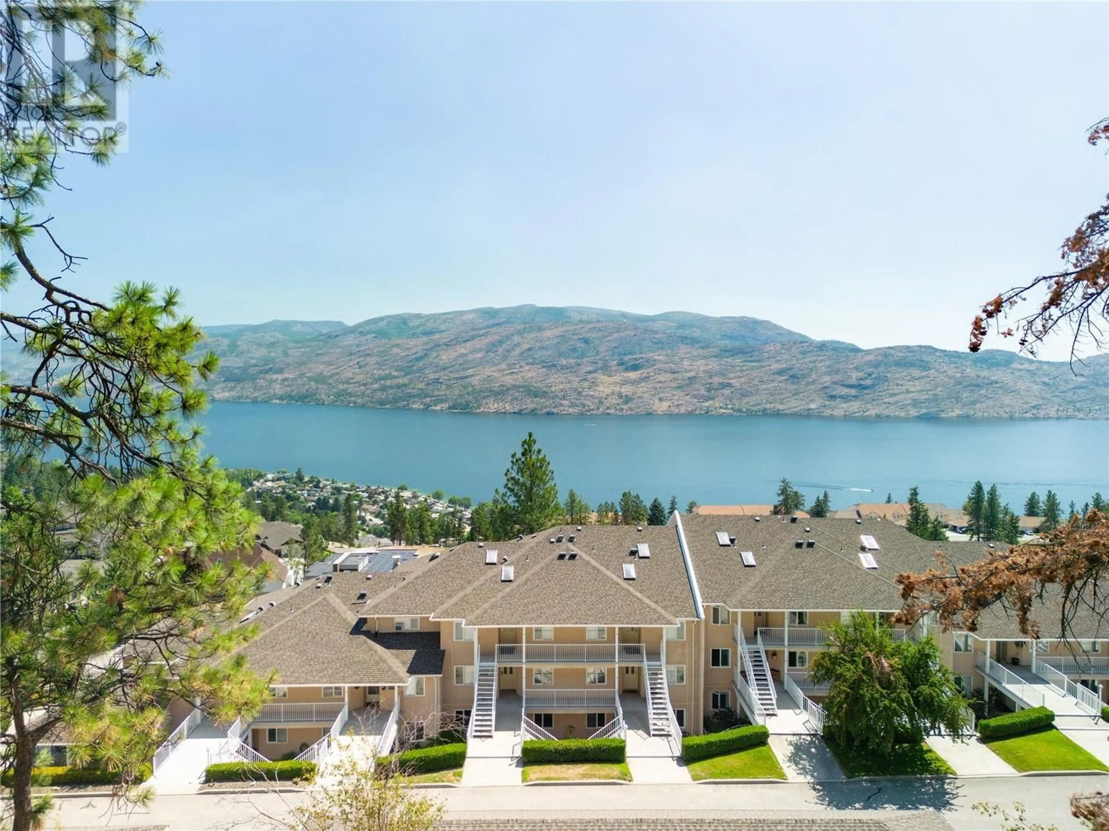 A pic from outside/outdoor area/front of a property/back of a property/a pic from drone, water/lake/river/ocean view for 308 - 4630 PONDEROSA DRIVE, Peachland British Columbia V0X1H5
