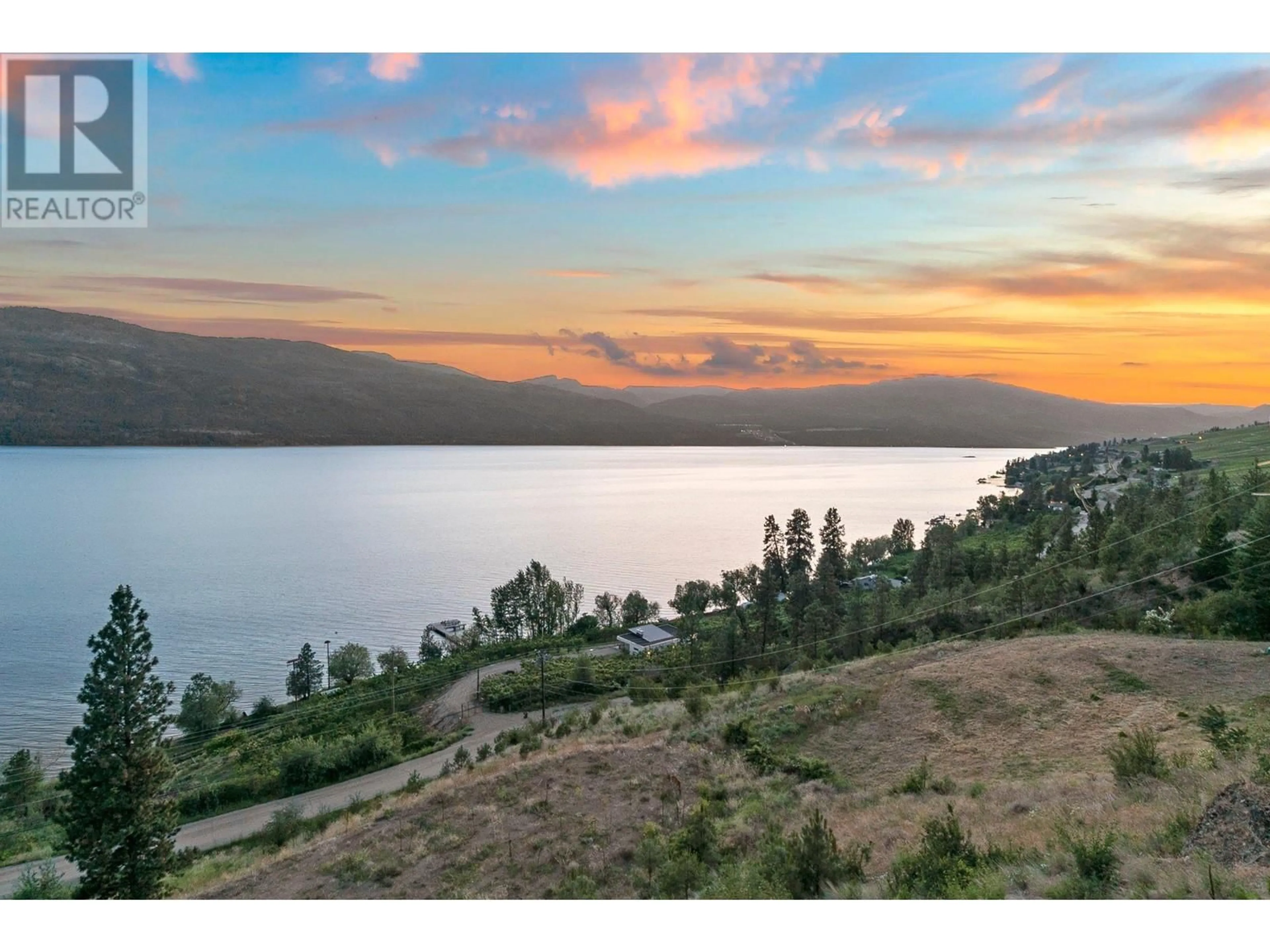A pic from outside/outdoor area/front of a property/back of a property/a pic from drone, water/lake/river/ocean view for 13938 MOBERLY ROAD, Lake Country British Columbia V4V1A6
