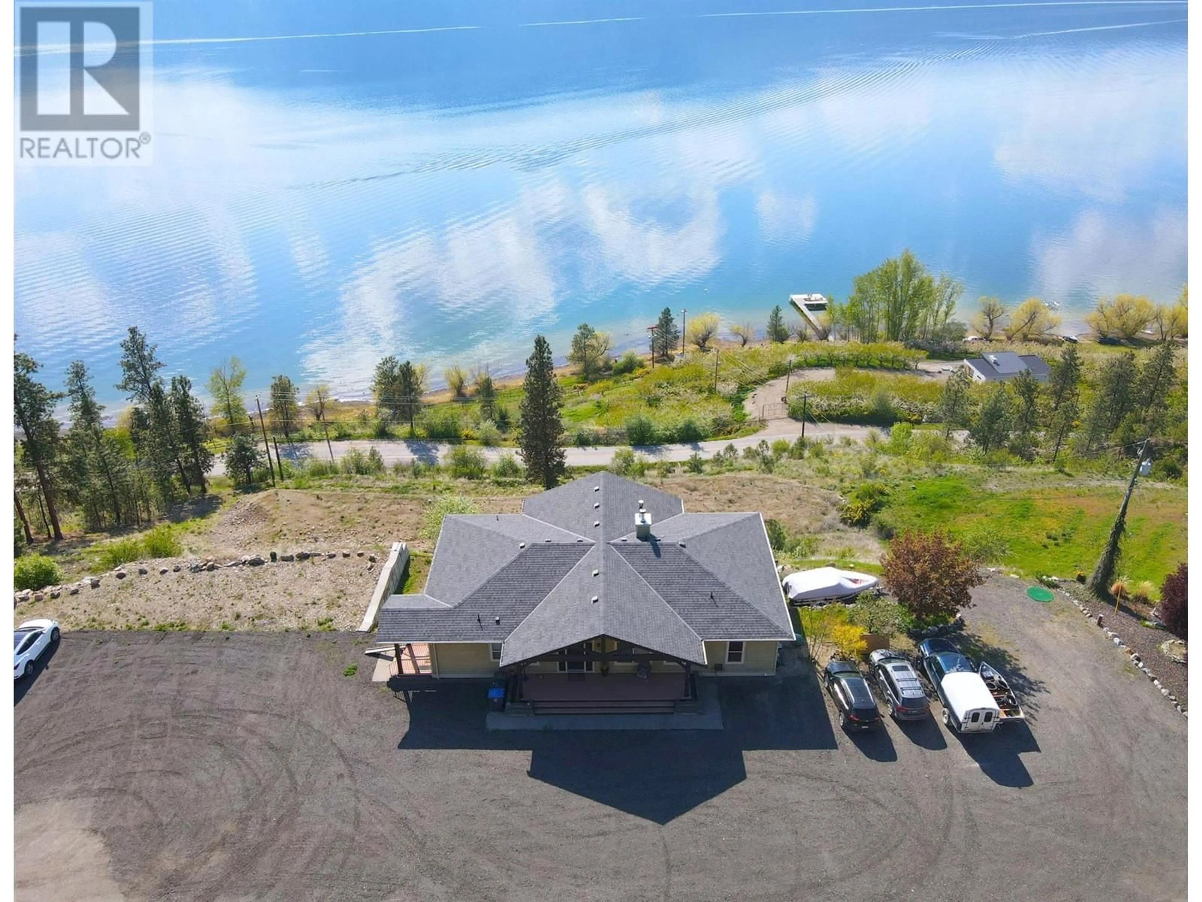 A pic from outside/outdoor area/front of a property/back of a property/a pic from drone, water/lake/river/ocean view for 13938 MOBERLY ROAD, Lake Country British Columbia V4V1A6
