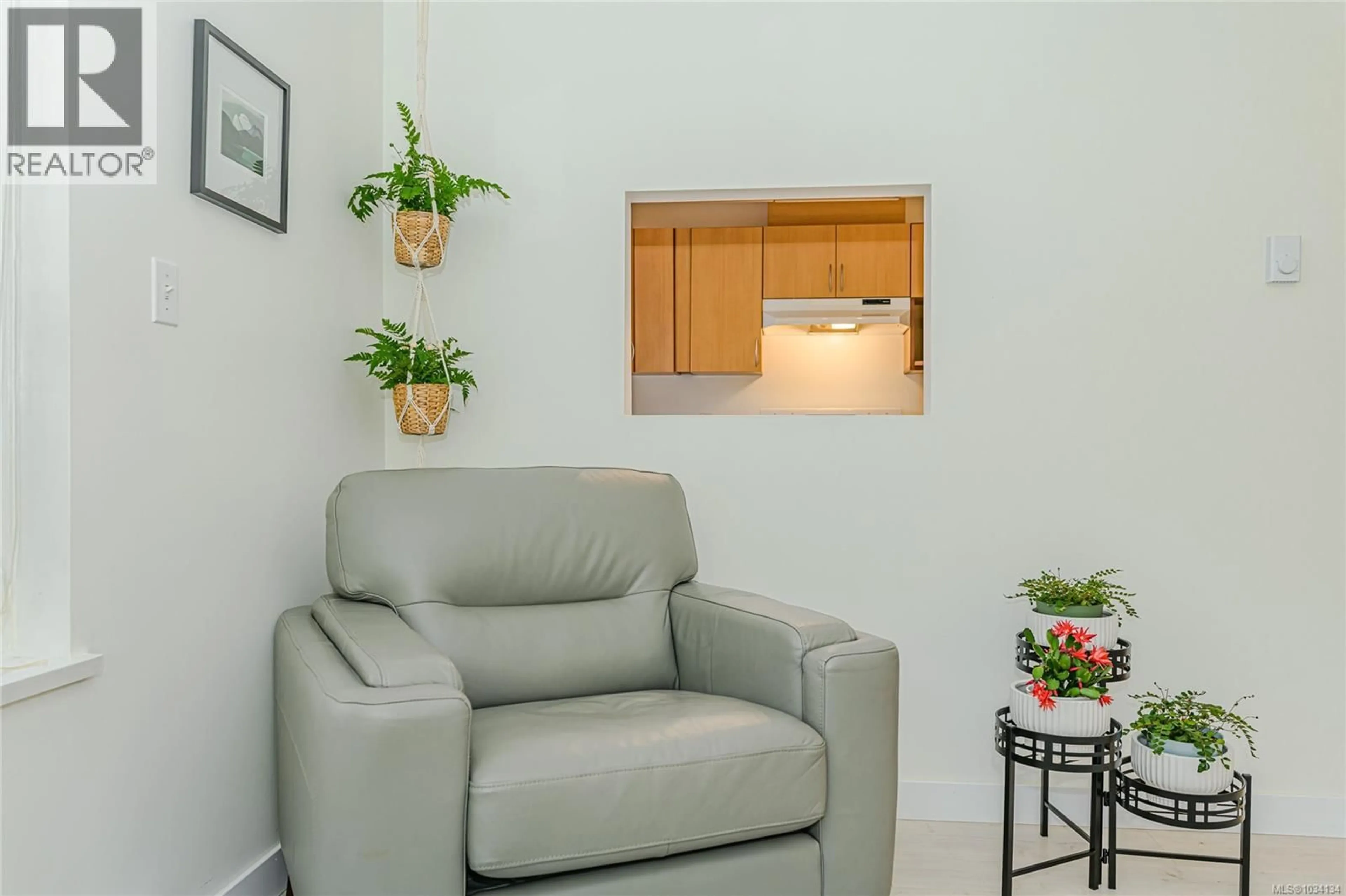 Living room with furniture, unknown for 103 - 3180 ALBINA STREET, Saanich British Columbia V9A1Z5