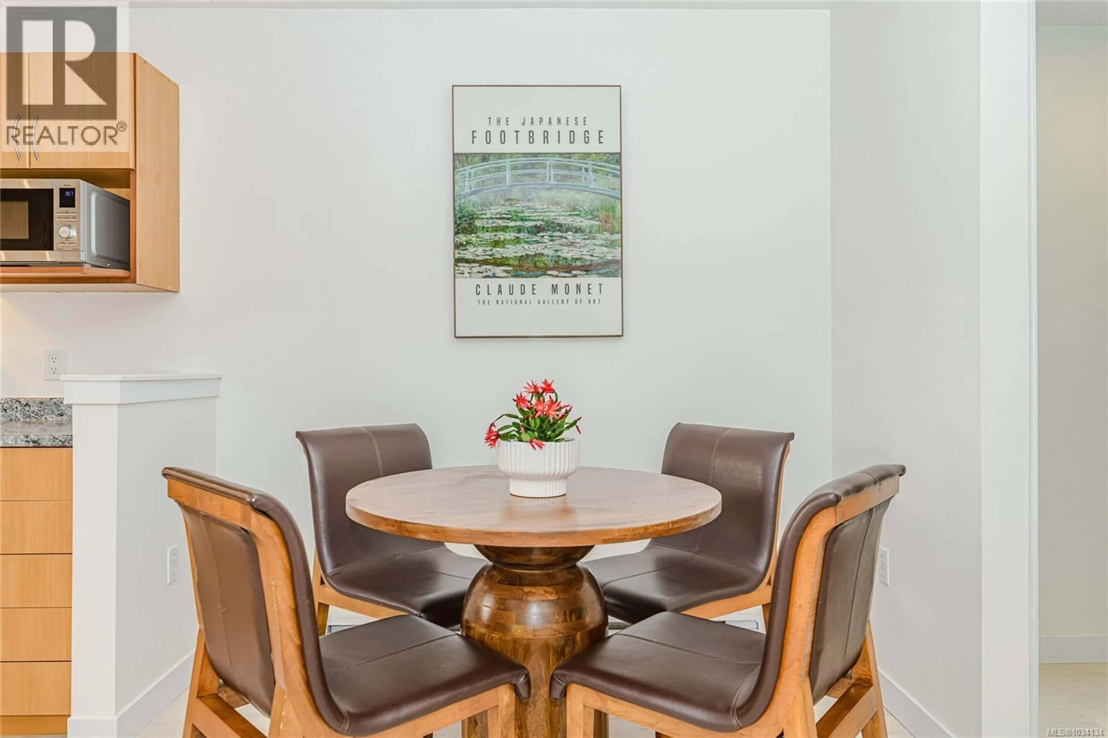 Dining room, wood/laminate floor for 103 - 3180 ALBINA STREET, Saanich British Columbia V9A1Z5