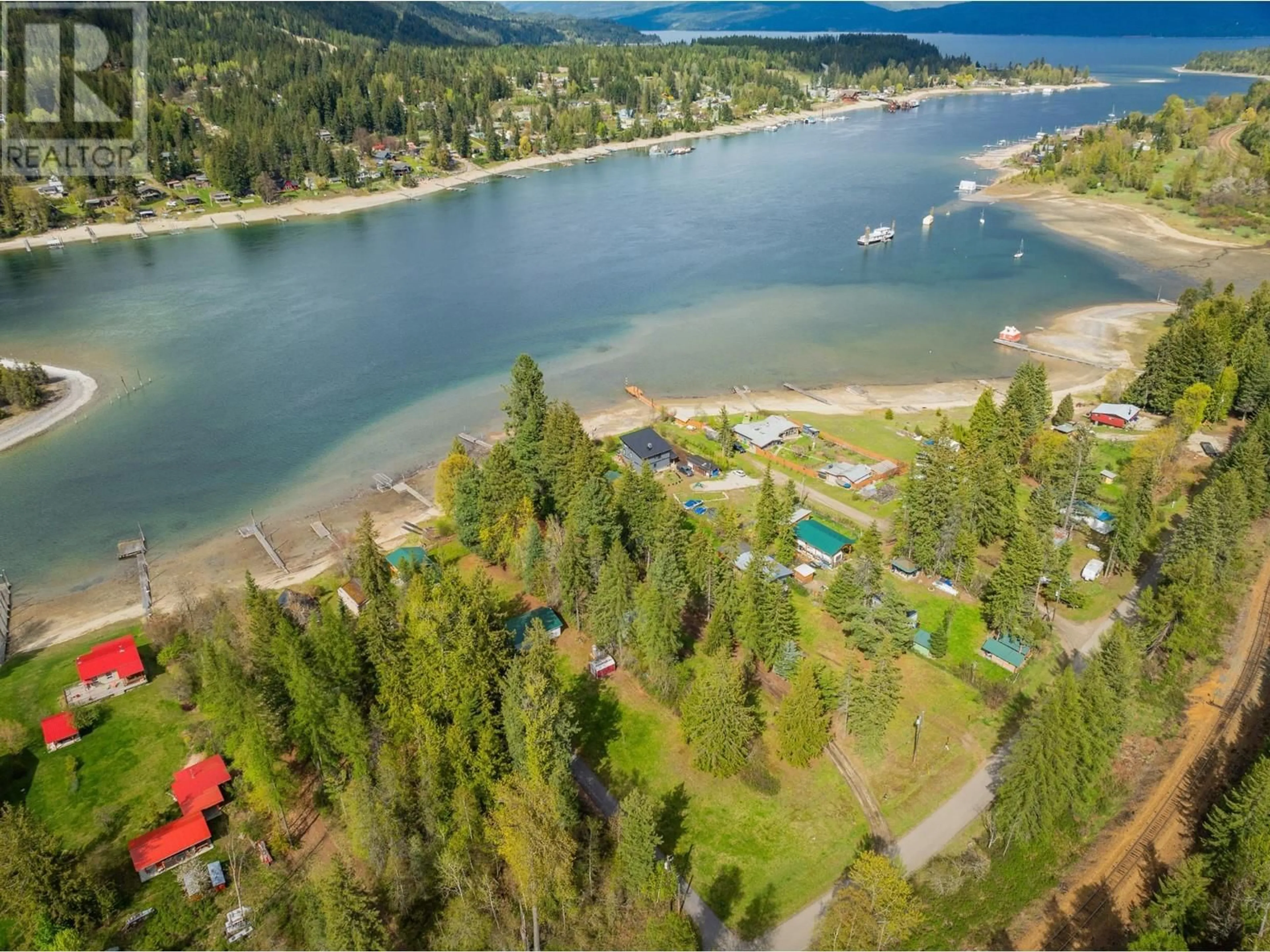 A pic from outside/outdoor area/front of a property/back of a property/a pic from drone, water/lake/river/ocean view for 7597 ROSS ROAD, Procter British Columbia V1L6R5