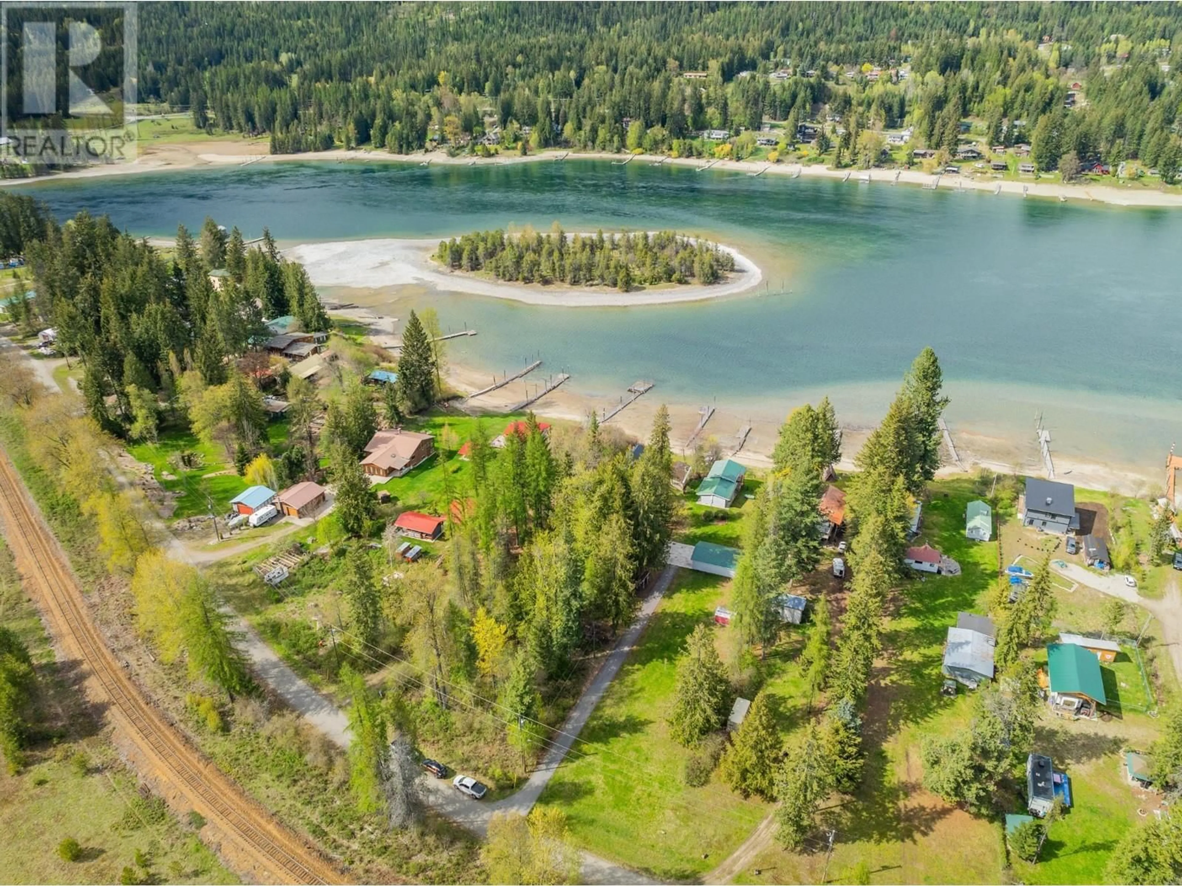 A pic from outside/outdoor area/front of a property/back of a property/a pic from drone, water/lake/river/ocean view for 7597 ROSS ROAD, Procter British Columbia V1L6R5