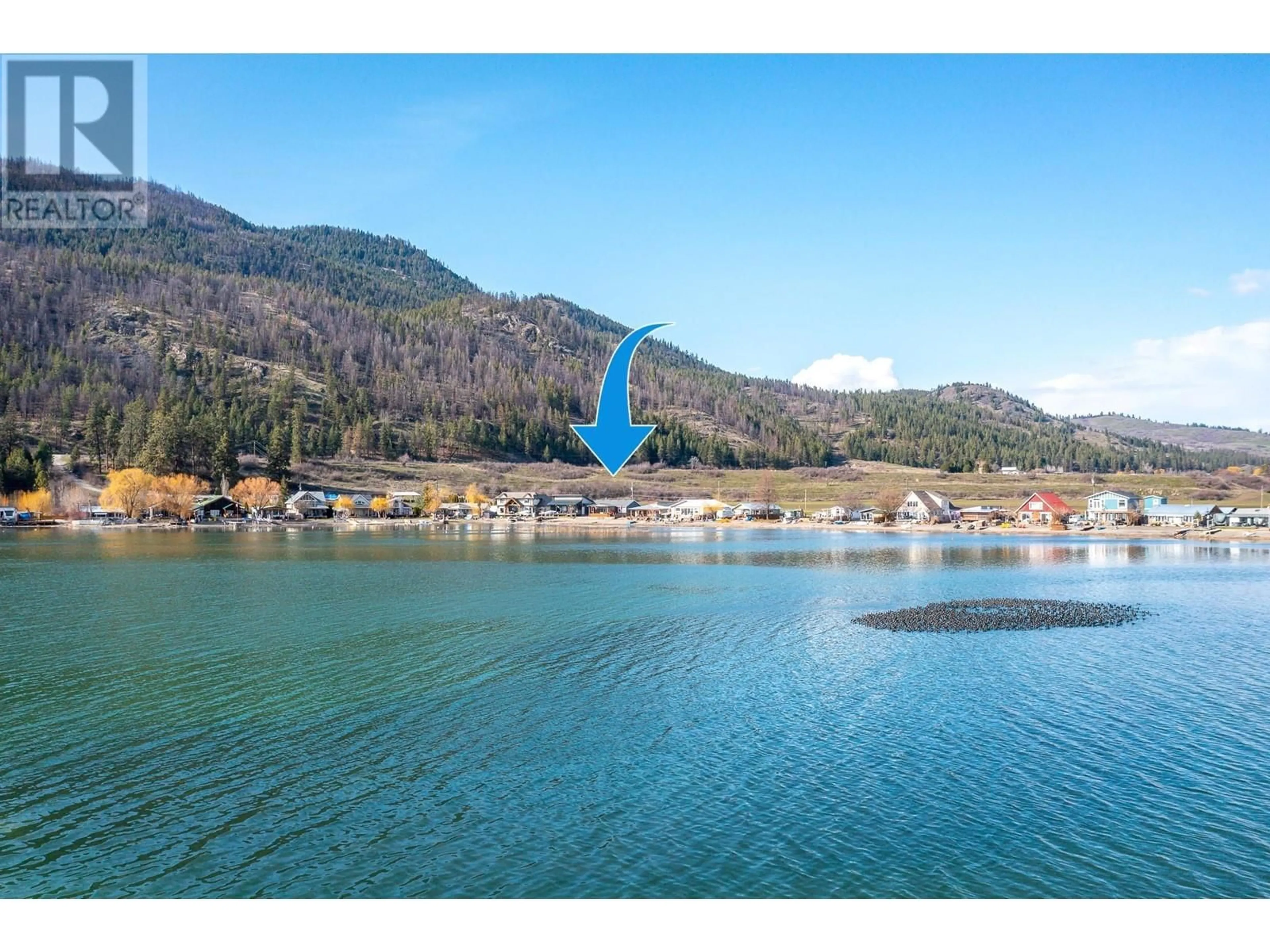 A pic from outside/outdoor area/front of a property/back of a property/a pic from drone, water/lake/river/ocean view for 11 LOUIS ESTATES ROAD, Vernon British Columbia V1H2A6