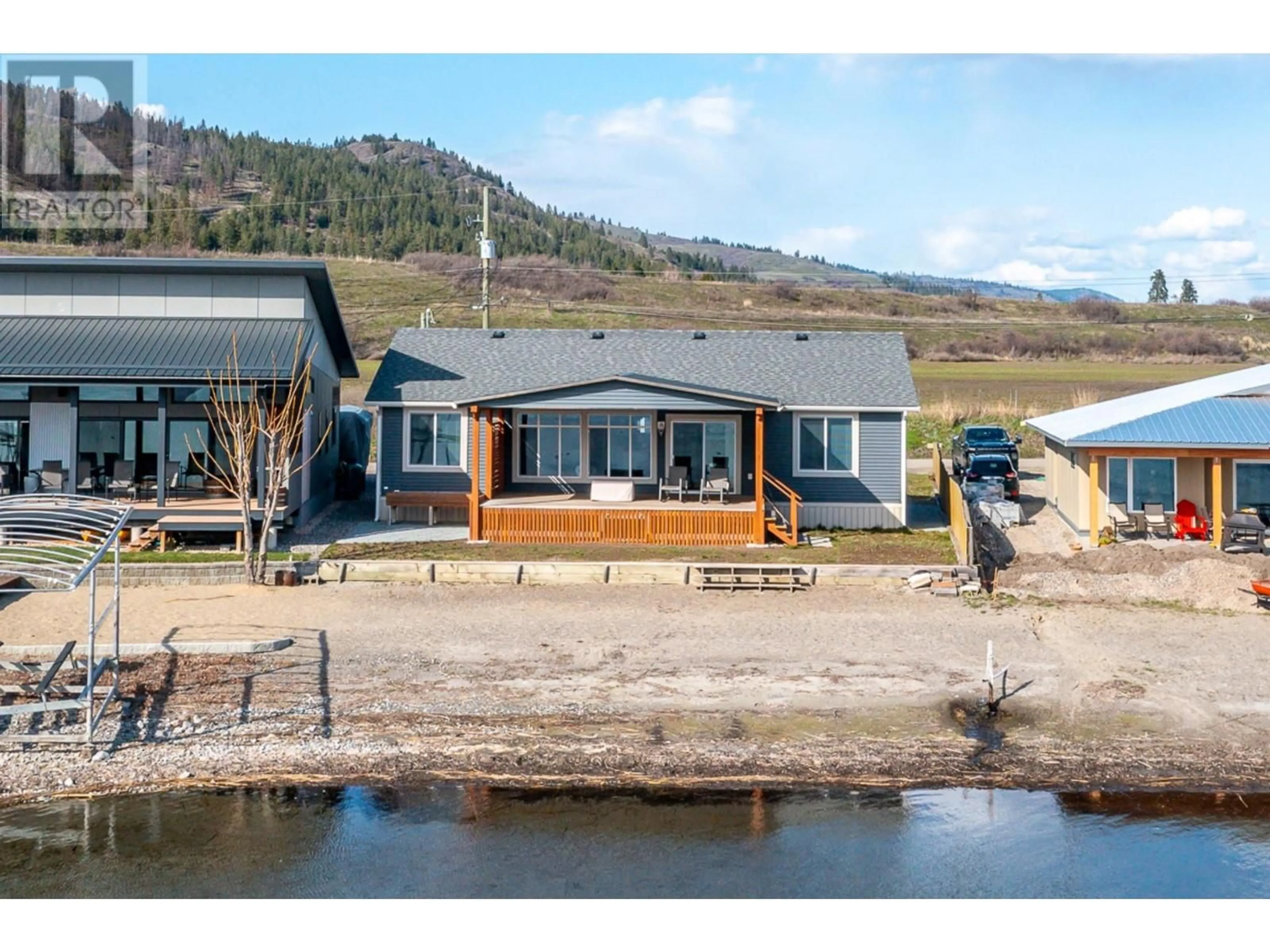 A pic from outside/outdoor area/front of a property/back of a property/a pic from drone, water/lake/river/ocean view for 11 LOUIS ESTATES ROAD, Vernon British Columbia V1H2A6