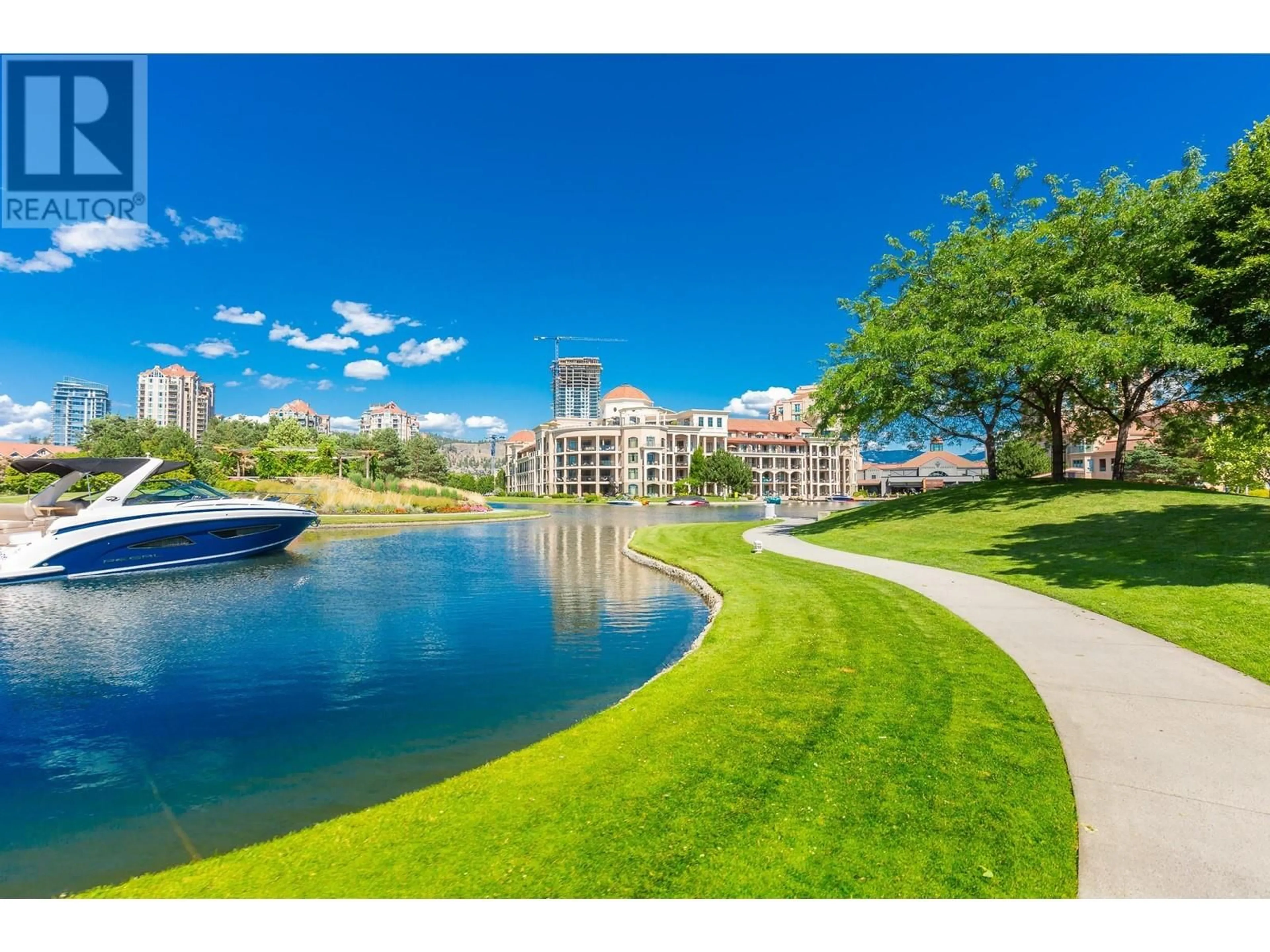 A pic from outside/outdoor area/front of a property/back of a property/a pic from drone, water/lake/river/ocean view for 342 - 1088 SUNSET DRIVE, Kelowna British Columbia V1Y9W1
