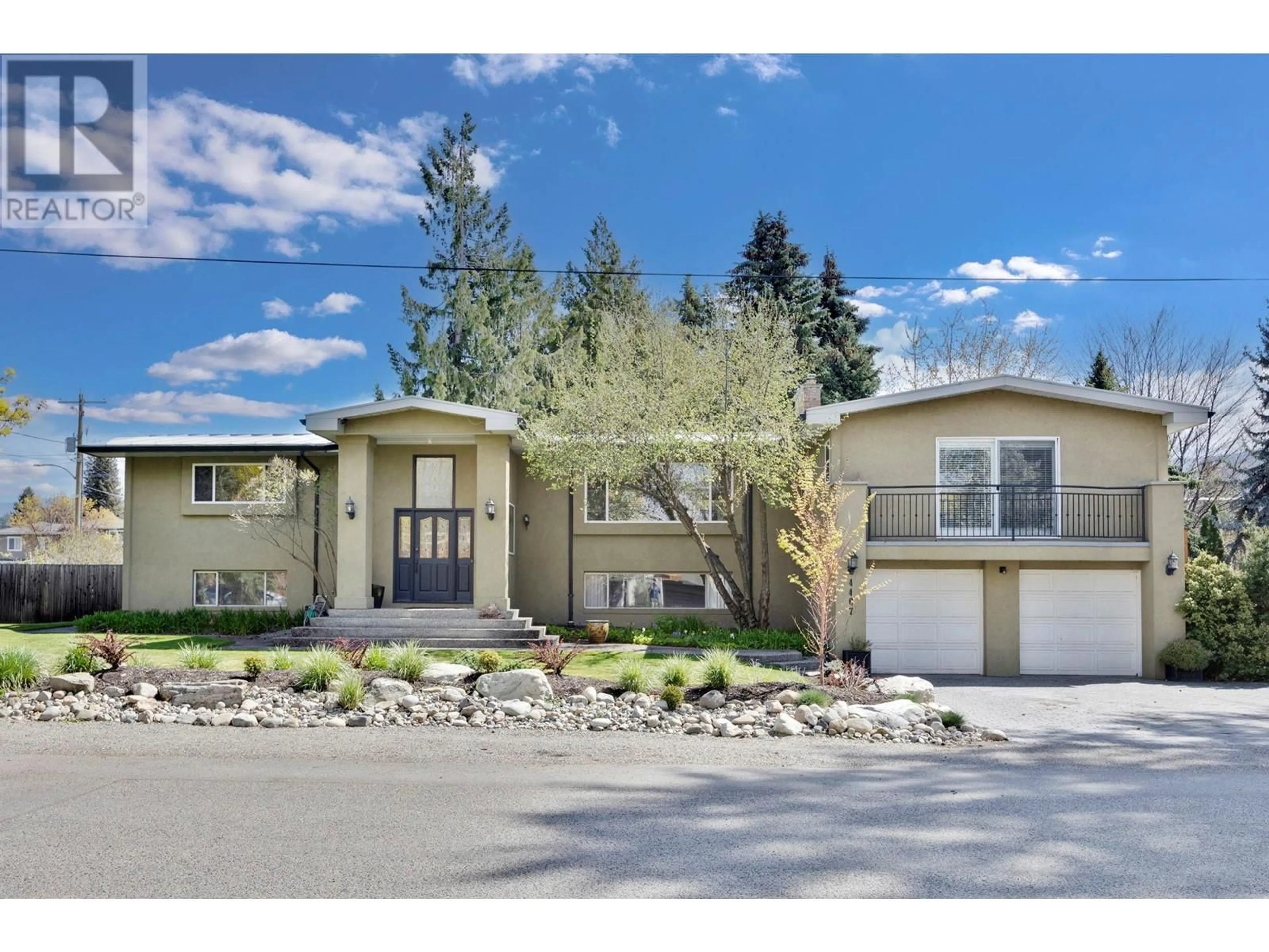 Home with vinyl exterior material, street for 4467 LAKELAND ROAD, Kelowna British Columbia V1W1E1