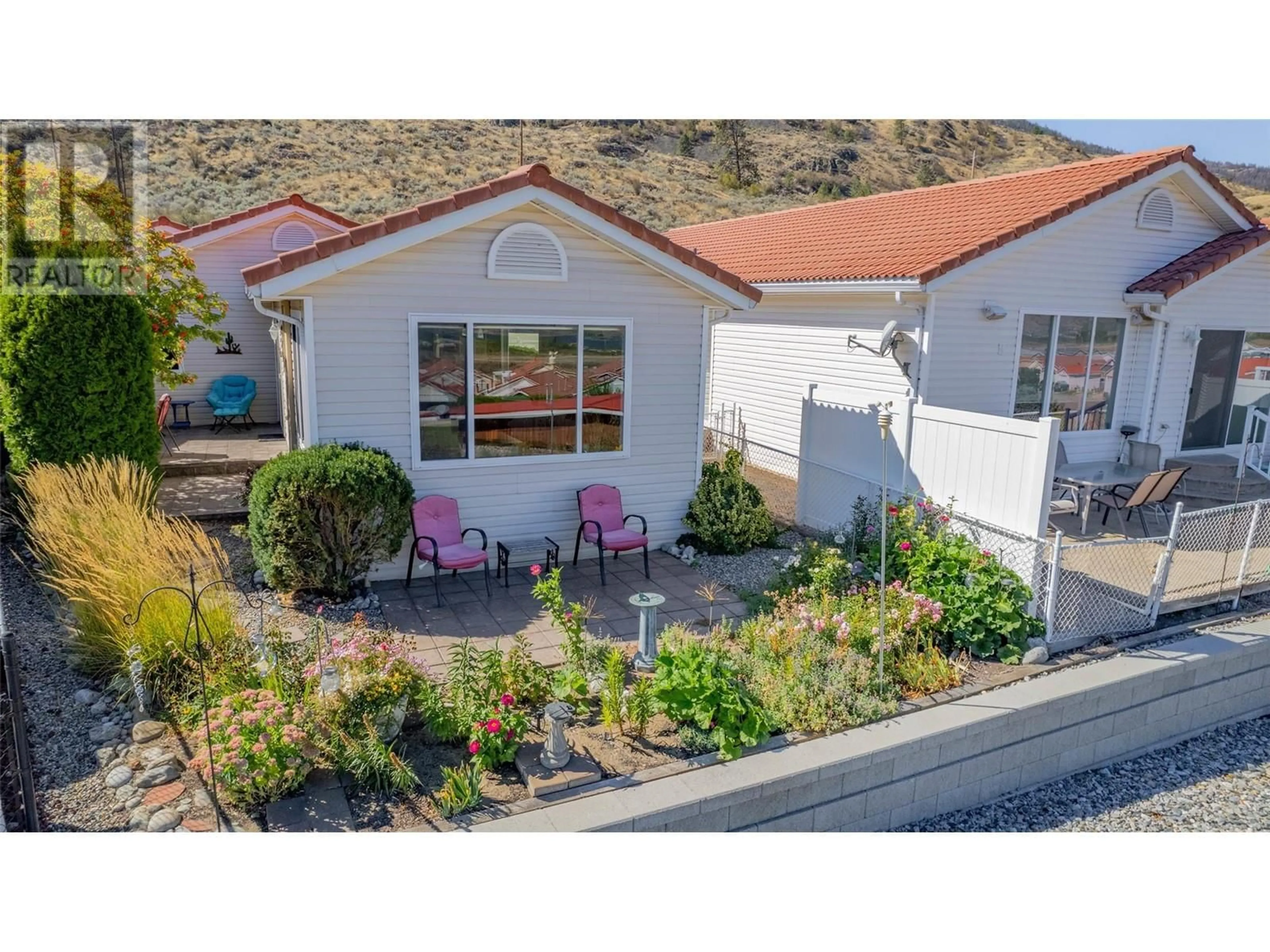 A pic from outside/outdoor area/front of a property/back of a property/a pic from drone, street for 48 - 9400 115TH STREET, Osoyoos British Columbia V0H1V5