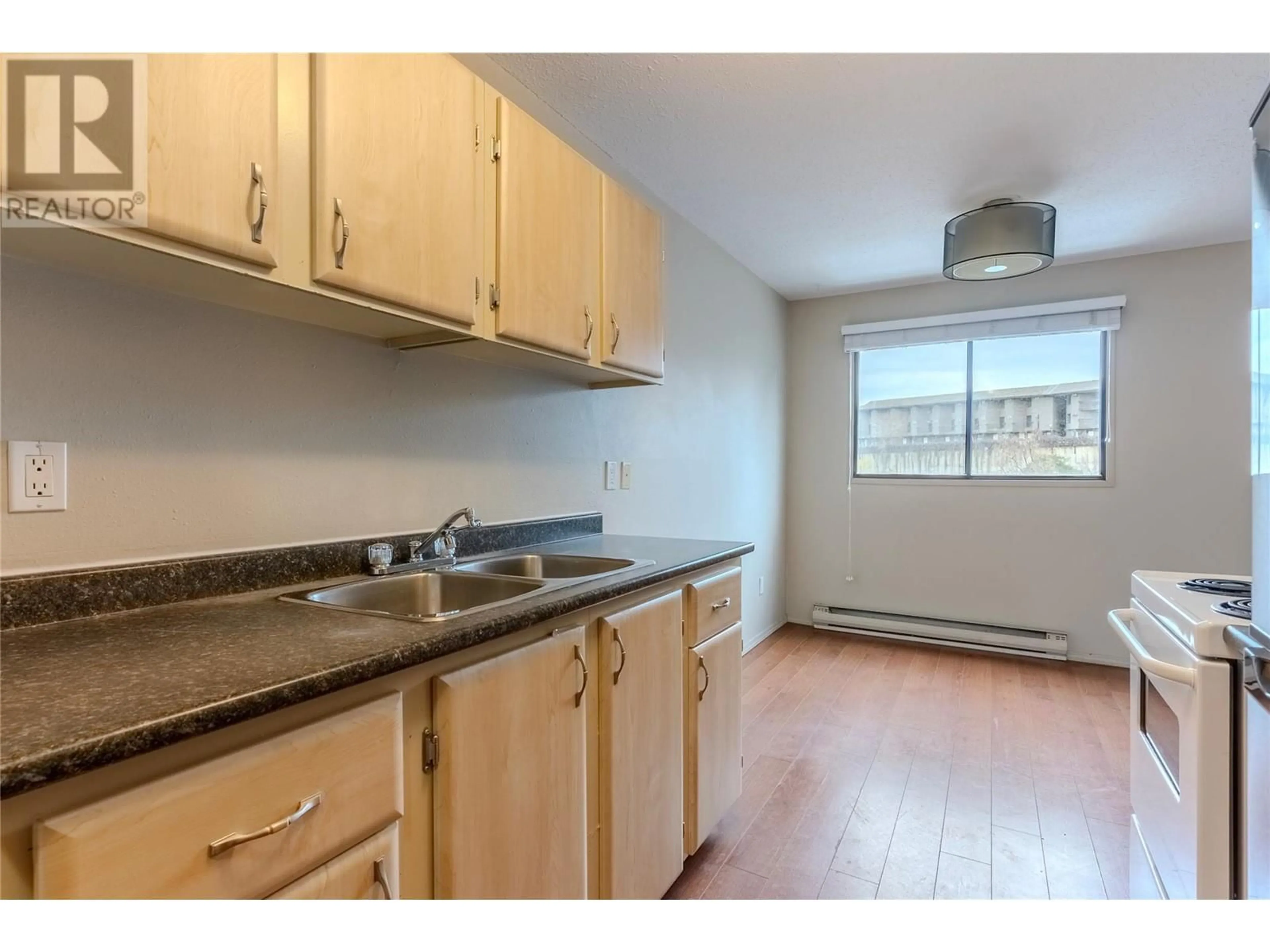Standard kitchen, wood/laminate floor for 312 - 555 DALGLEISH DRIVE, Kamloops British Columbia V2C6C7