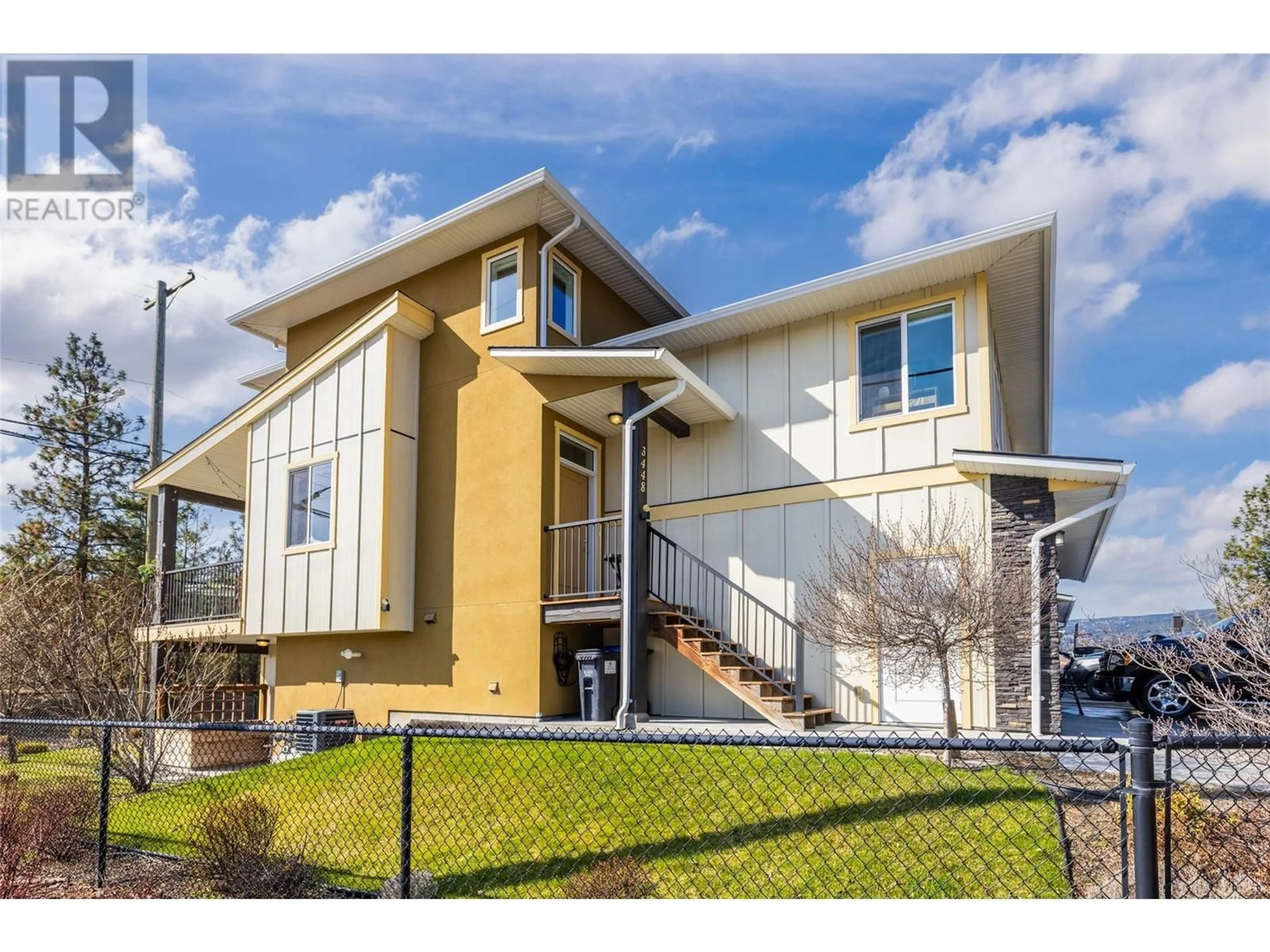 Home with vinyl exterior material, street for 3448 COUGAR ROAD, West Kelowna British Columbia V4T2H1