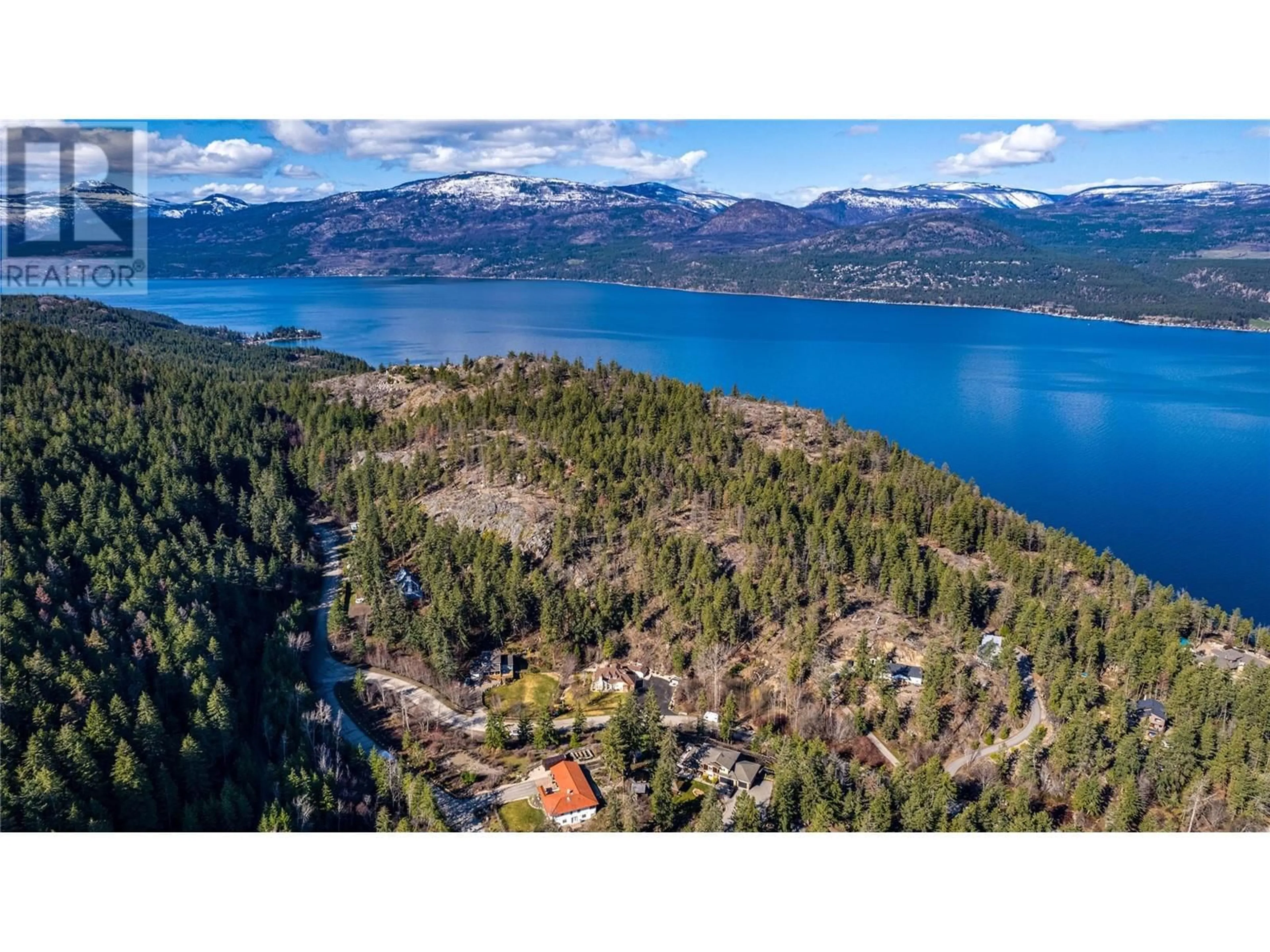 A pic from outside/outdoor area/front of a property/back of a property/a pic from drone, water/lake/river/ocean view for 9292 CHINOOK ROAD, Vernon British Columbia V1H1K3