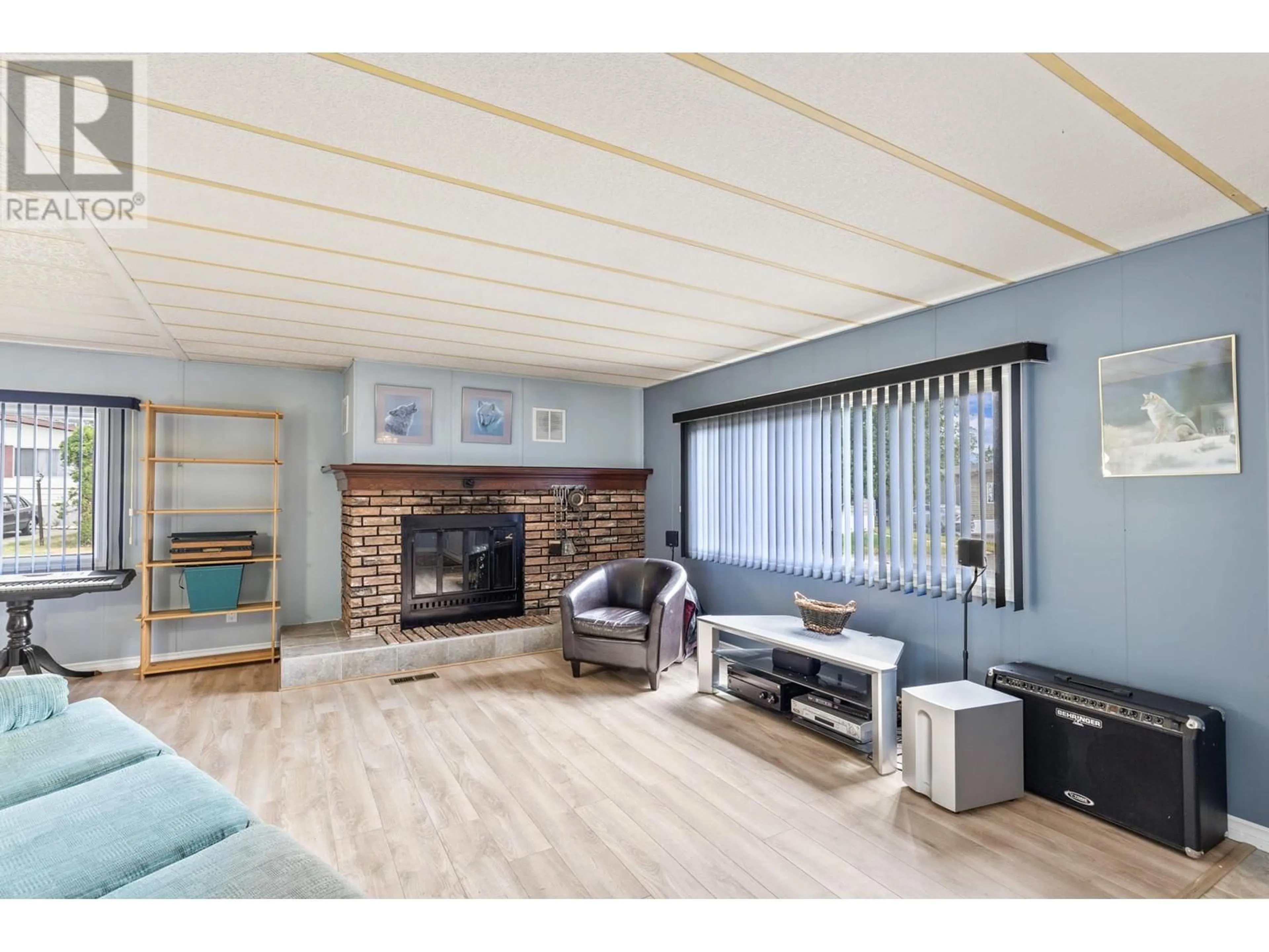 Living room with furniture, wood/laminate floor for 178 - 1880 OLD BOUCHERIE ROAD, Westbank British Columbia V4T1Z2