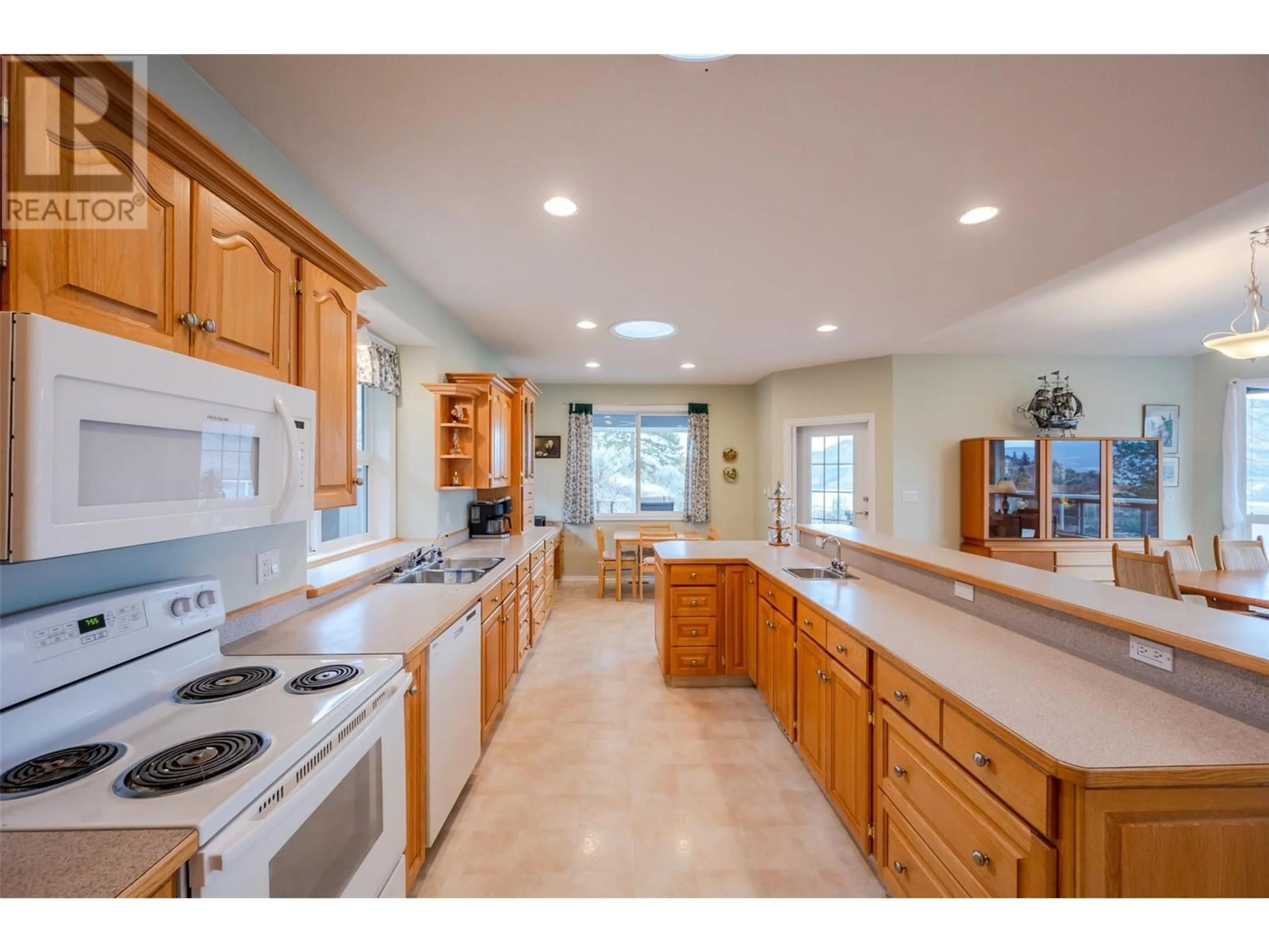 Open concept kitchen, ceramic/tile floor for 19409 MCDOUGALD ROAD, Summerland British Columbia V0H1Z6