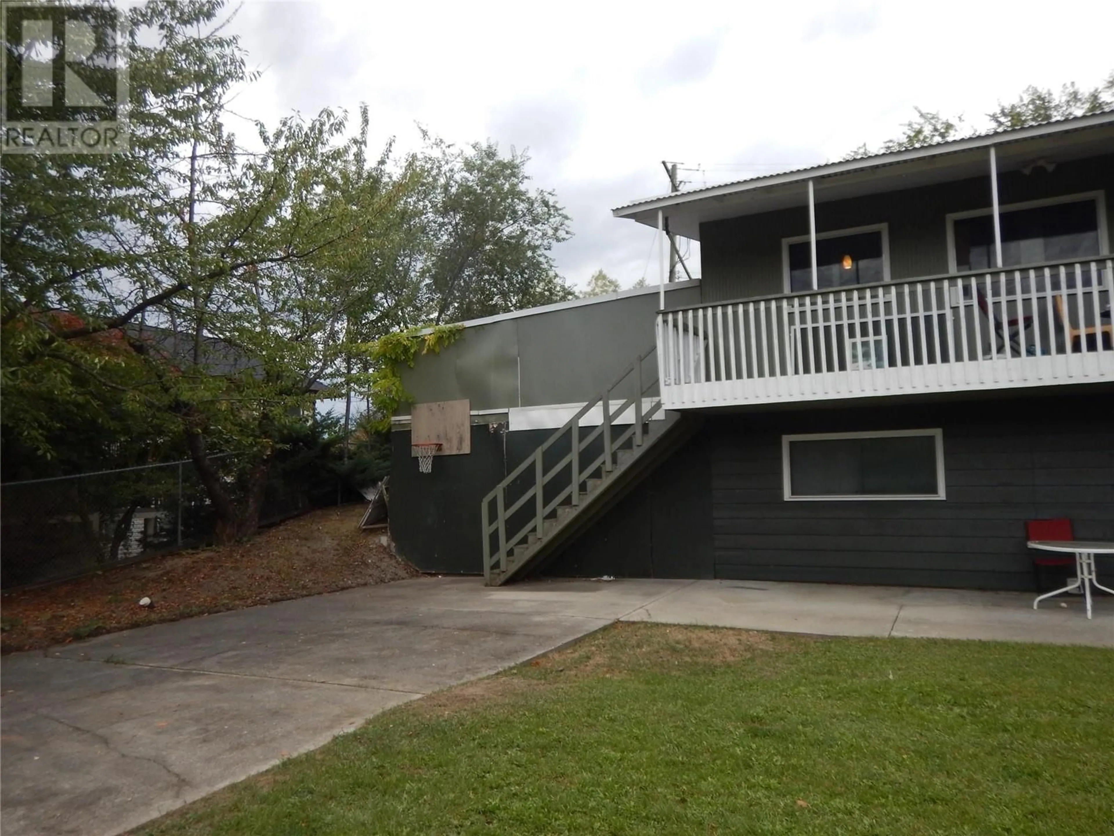 A pic from outside/outdoor area/front of a property/back of a property/a pic from drone, street for 4732 HERITAGE DRIVE, Vernon British Columbia V1T7V2