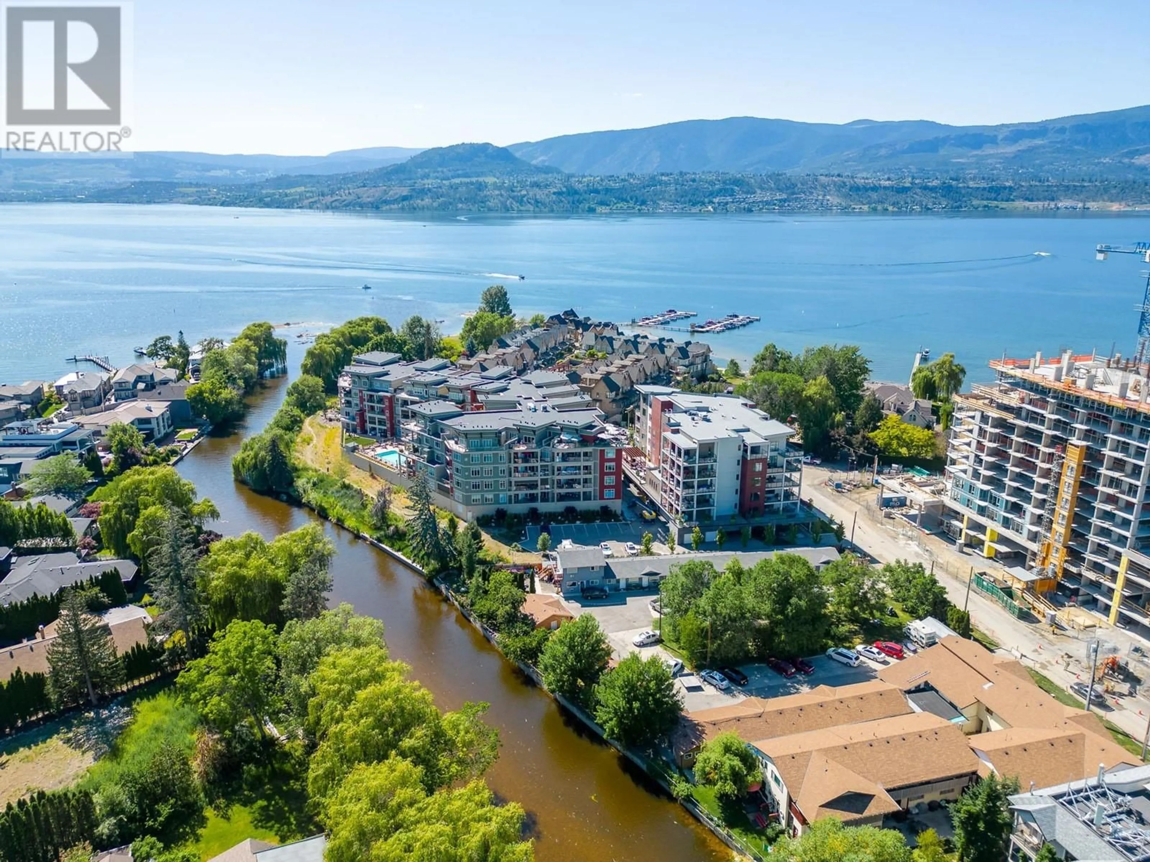 A pic from outside/outdoor area/front of a property/back of a property/a pic from drone, water/lake/river/ocean view for 523 - 3880 TRUSWELL ROAD, Kelowna British Columbia V1W5A2