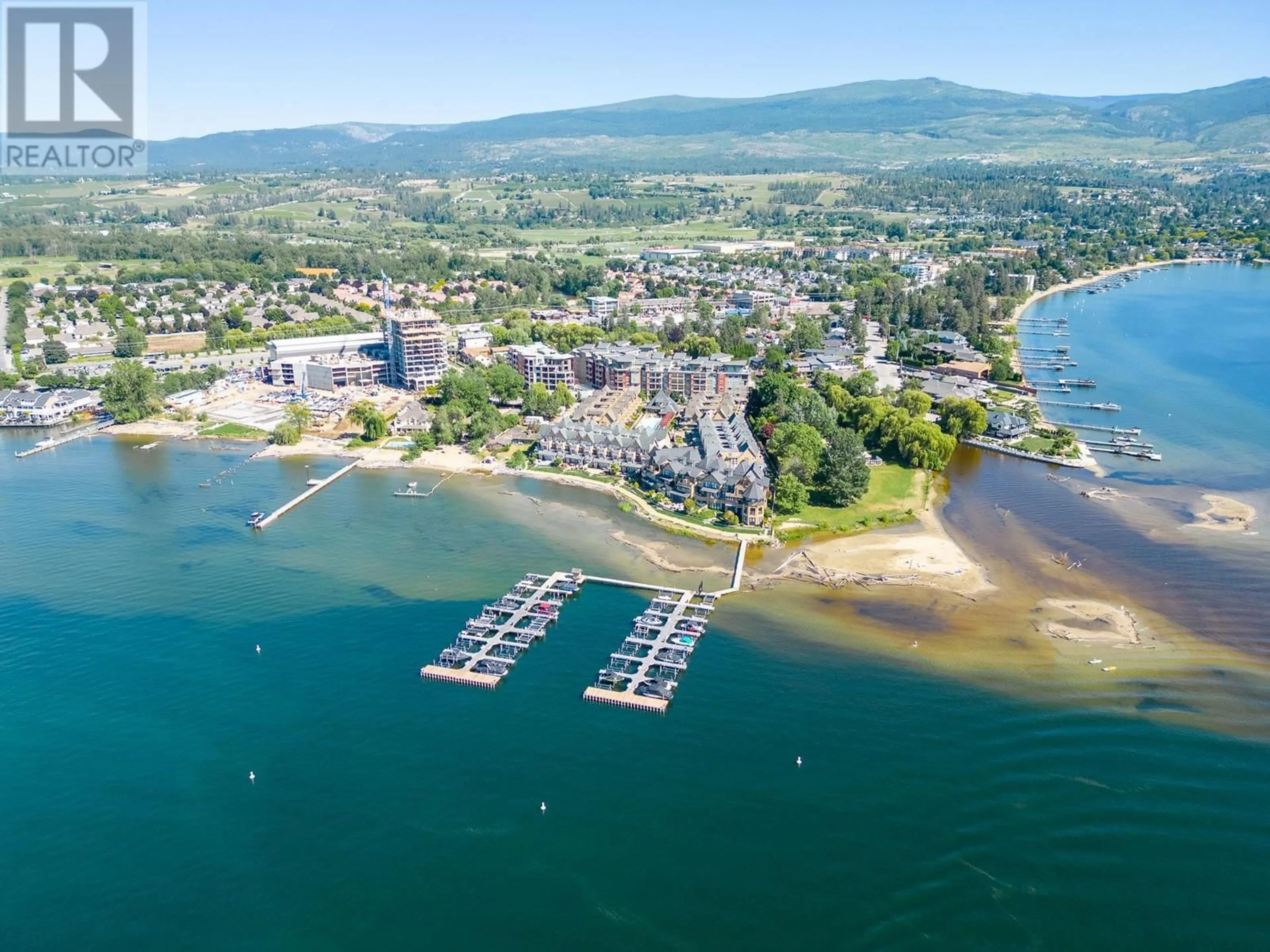 A pic from outside/outdoor area/front of a property/back of a property/a pic from drone, water/lake/river/ocean view for 523 - 3880 TRUSWELL ROAD, Kelowna British Columbia V1W5A2