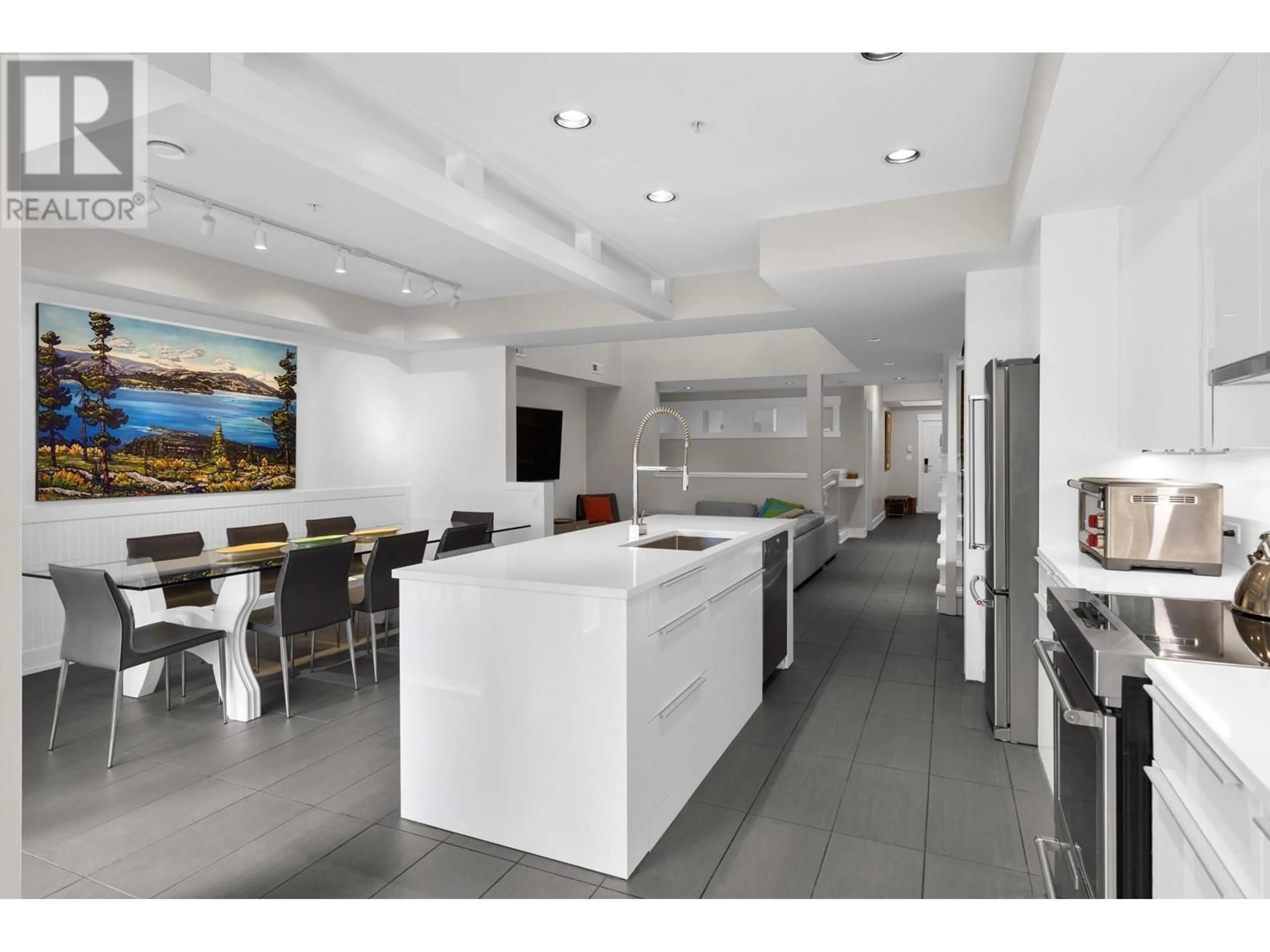 Open concept kitchen, ceramic/tile floor for 523 - 3880 TRUSWELL ROAD, Kelowna British Columbia V1W5A2