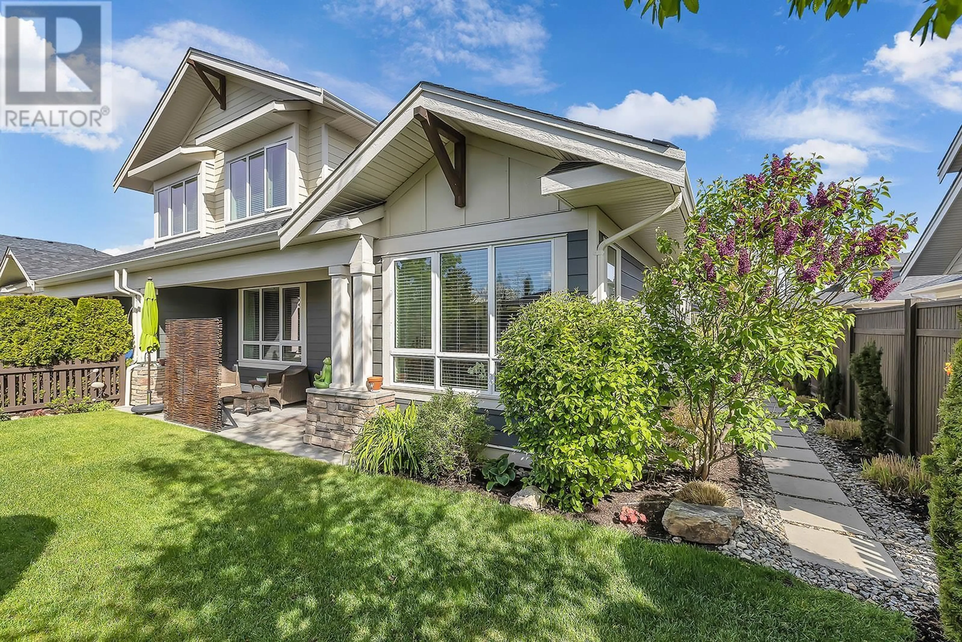 Home with vinyl exterior material, street for 54 - 1960 KLO ROAD, Kelowna British Columbia V1W5L2