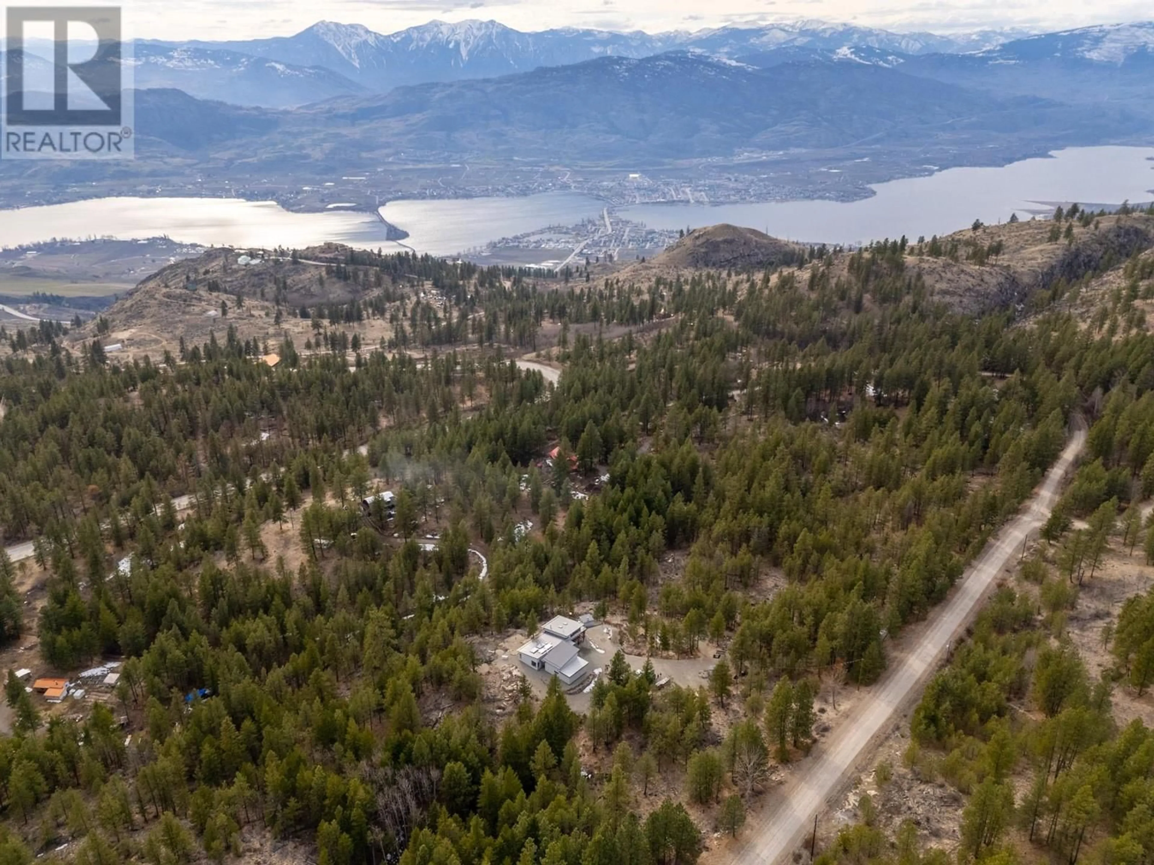 A pic from outside/outdoor area/front of a property/back of a property/a pic from drone, mountain view for 169 LONGVIEW ROAD, Osoyoos British Columbia V0H1V6
