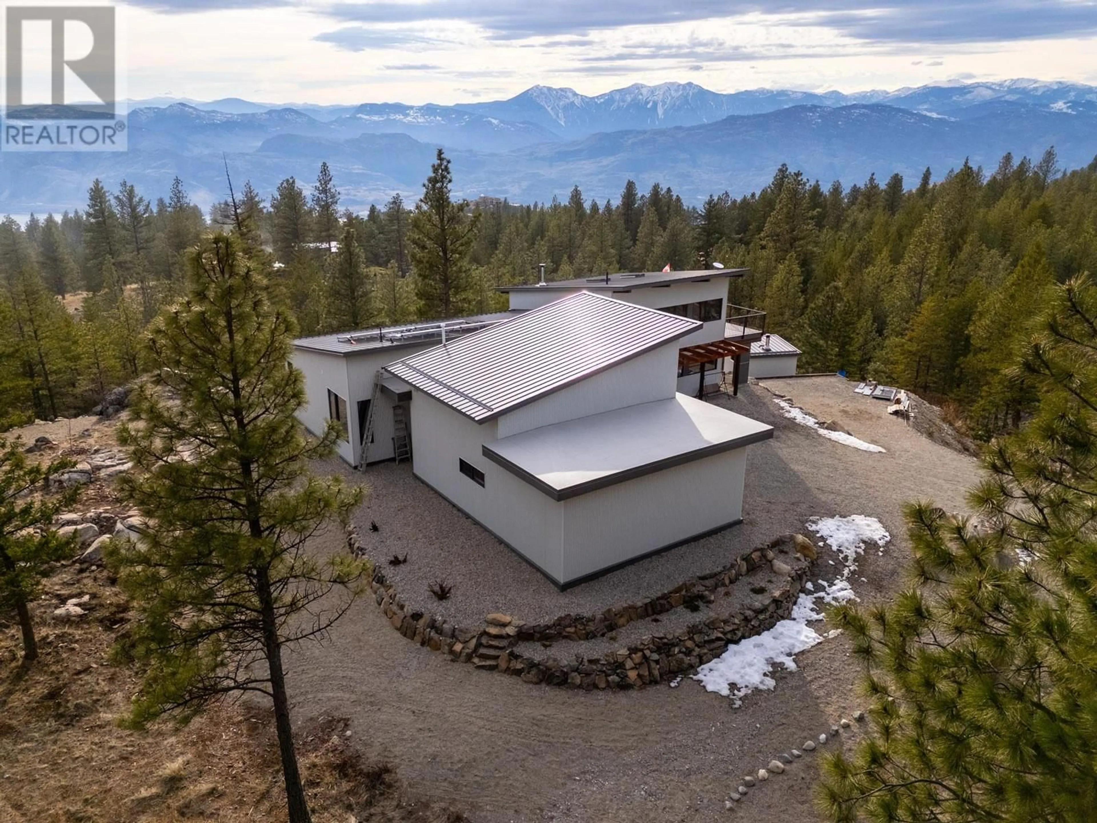 A pic from outside/outdoor area/front of a property/back of a property/a pic from drone, mountain view for 169 LONGVIEW ROAD, Osoyoos British Columbia V0H1V6