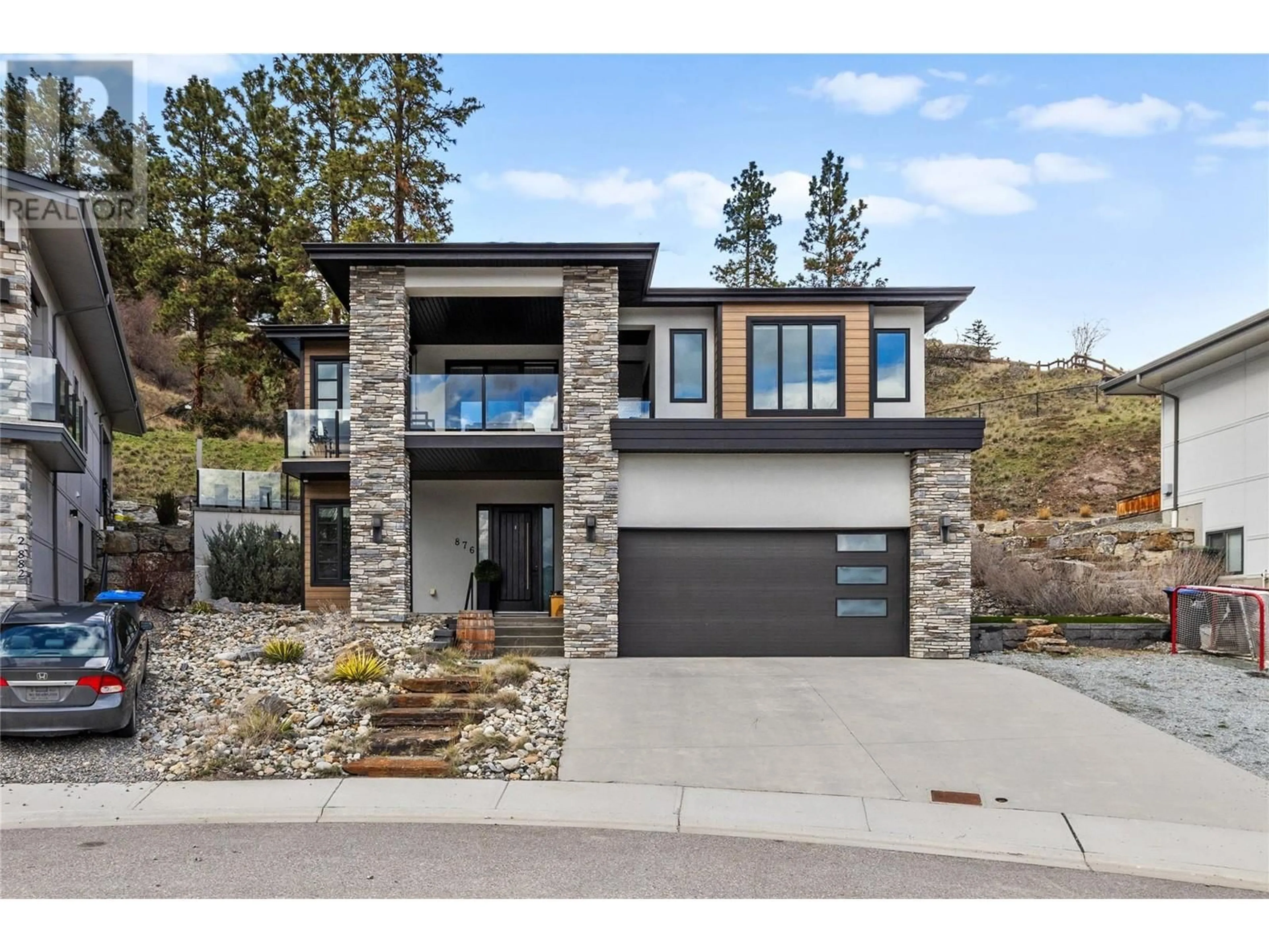 Home with brick exterior material, mountain view for 876 BOYNTON PLACE, Kelowna British Columbia V1V2Y1
