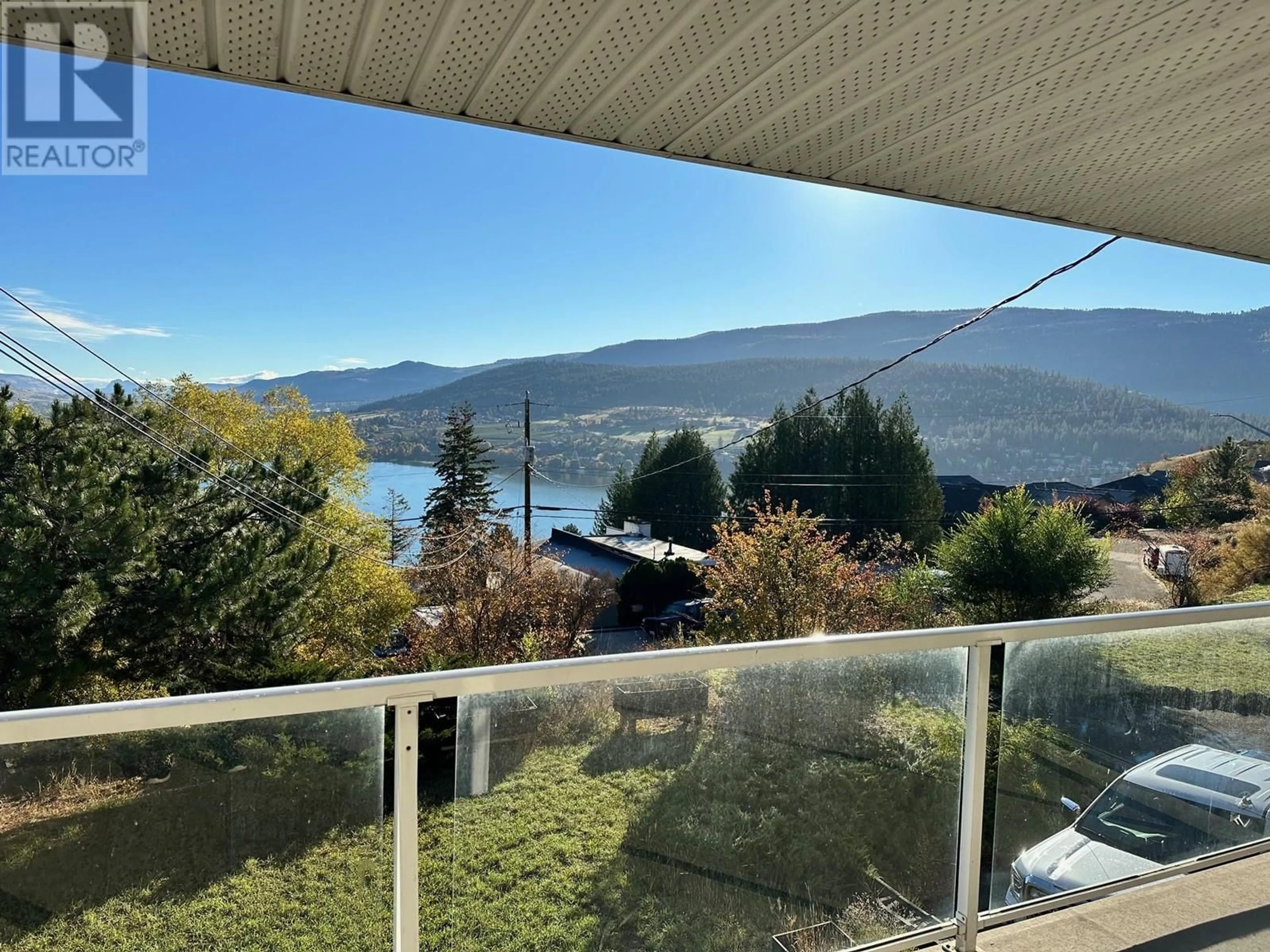 A pic from outside/outdoor area/front of a property/back of a property/a pic from drone, water/lake/river/ocean view for 7910 LAKEVIEW DRIVE, Coldstream British Columbia V1B1W3