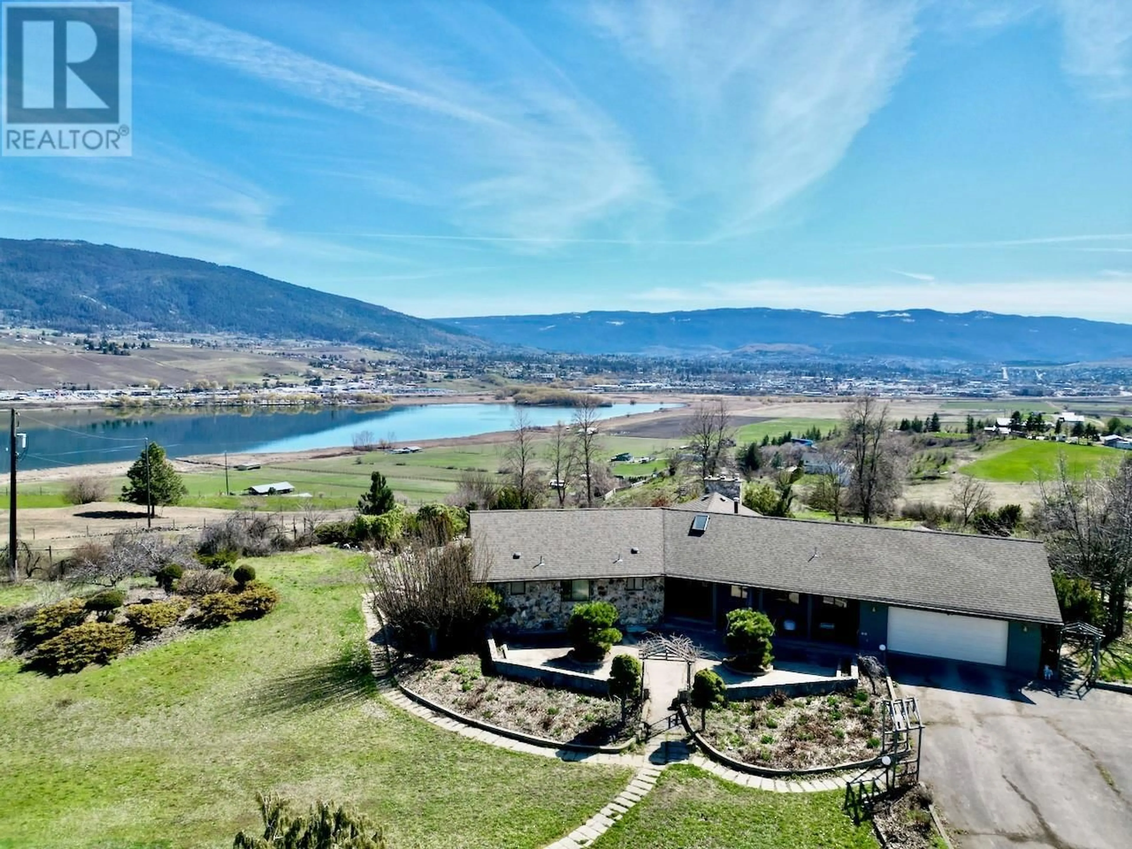 A pic from outside/outdoor area/front of a property/back of a property/a pic from drone, water/lake/river/ocean view for 6841 RAVEN ROAD, Vernon British Columbia V1H1P9