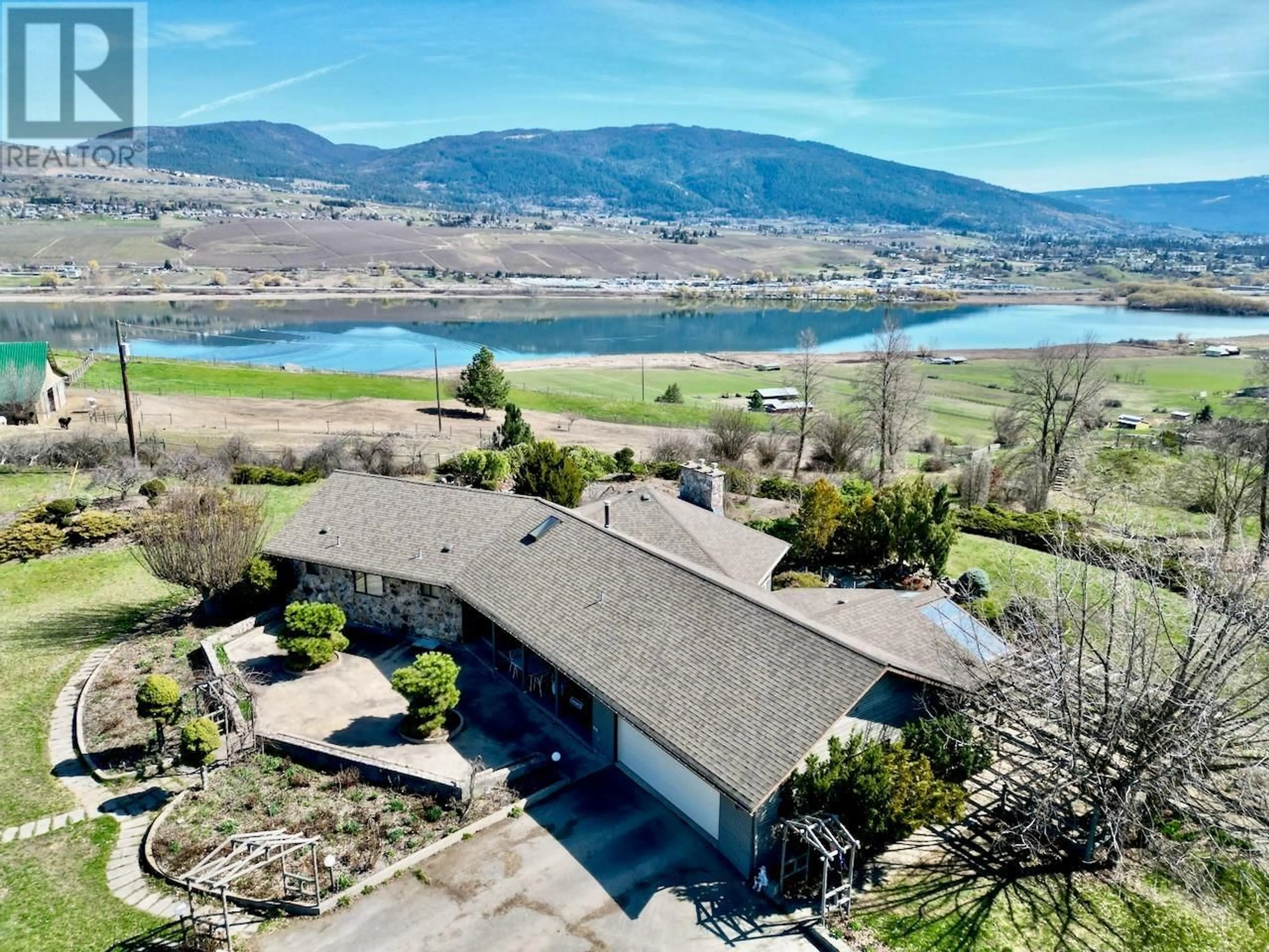 A pic from outside/outdoor area/front of a property/back of a property/a pic from drone, water/lake/river/ocean view for 6841 RAVEN ROAD, Vernon British Columbia V1H1P9