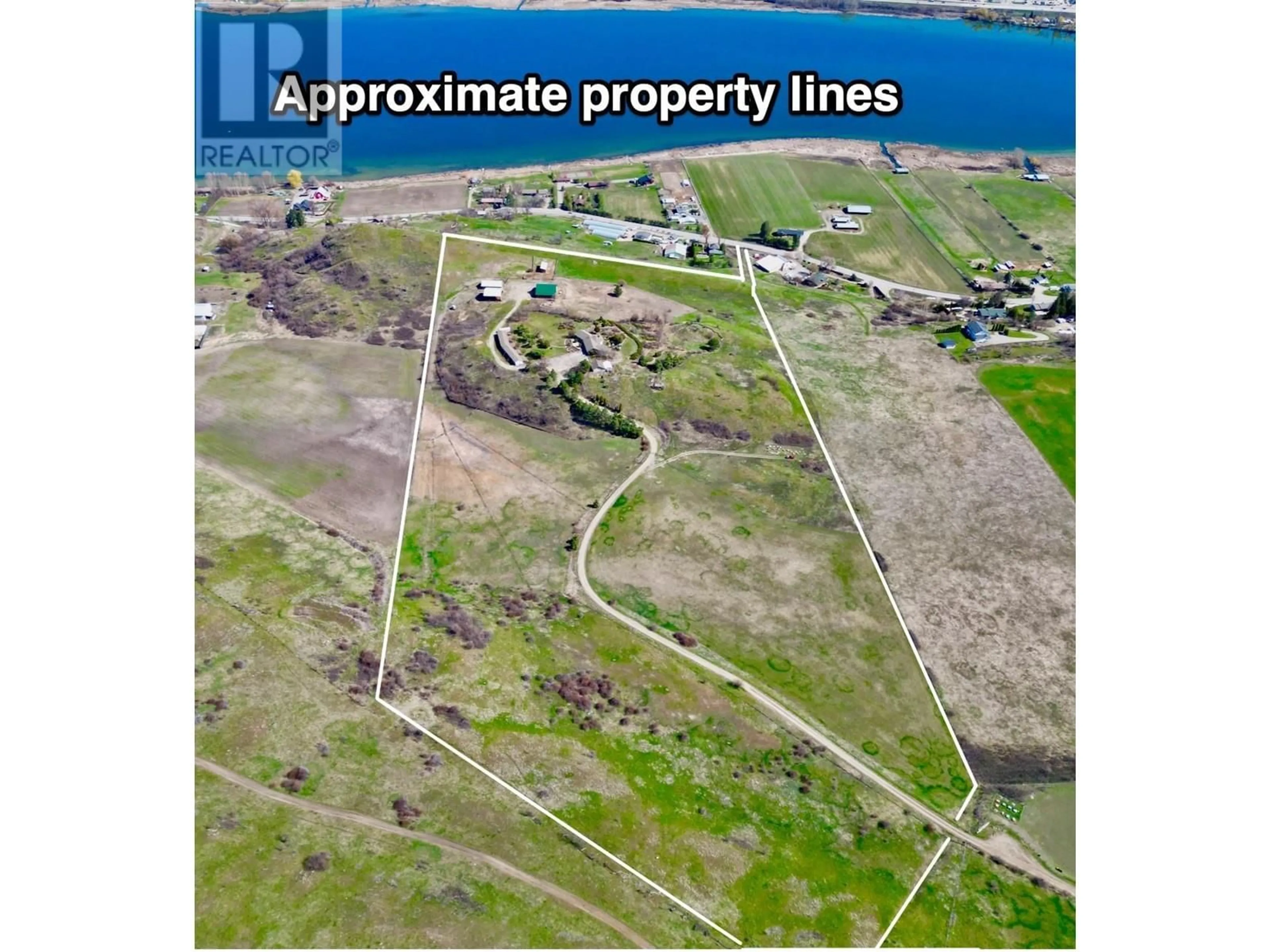 A pic from outside/outdoor area/front of a property/back of a property/a pic from drone, unknown for 6841 RAVEN ROAD, Vernon British Columbia V1H1P9