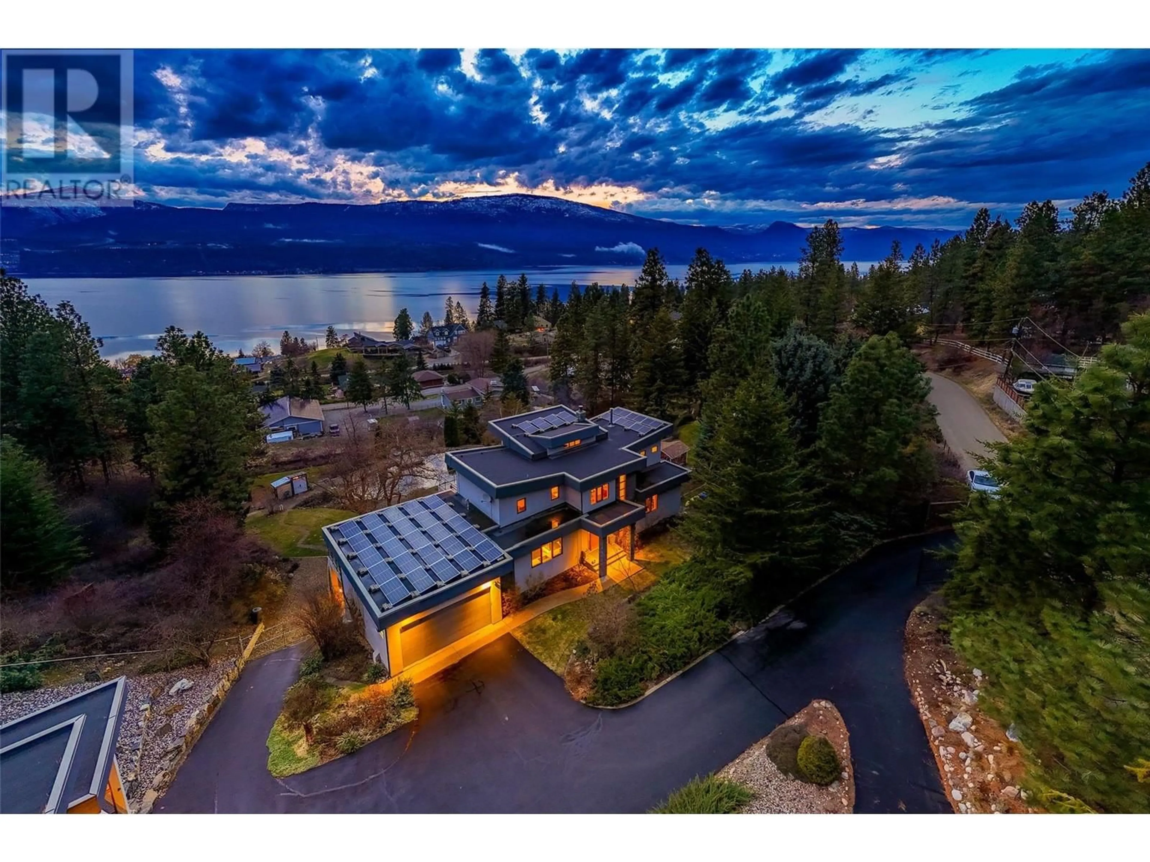 A pic from outside/outdoor area/front of a property/back of a property/a pic from drone, water/lake/river/ocean view for 16550 CARBONNEAU ROAD, Lake Country British Columbia V4V1B3