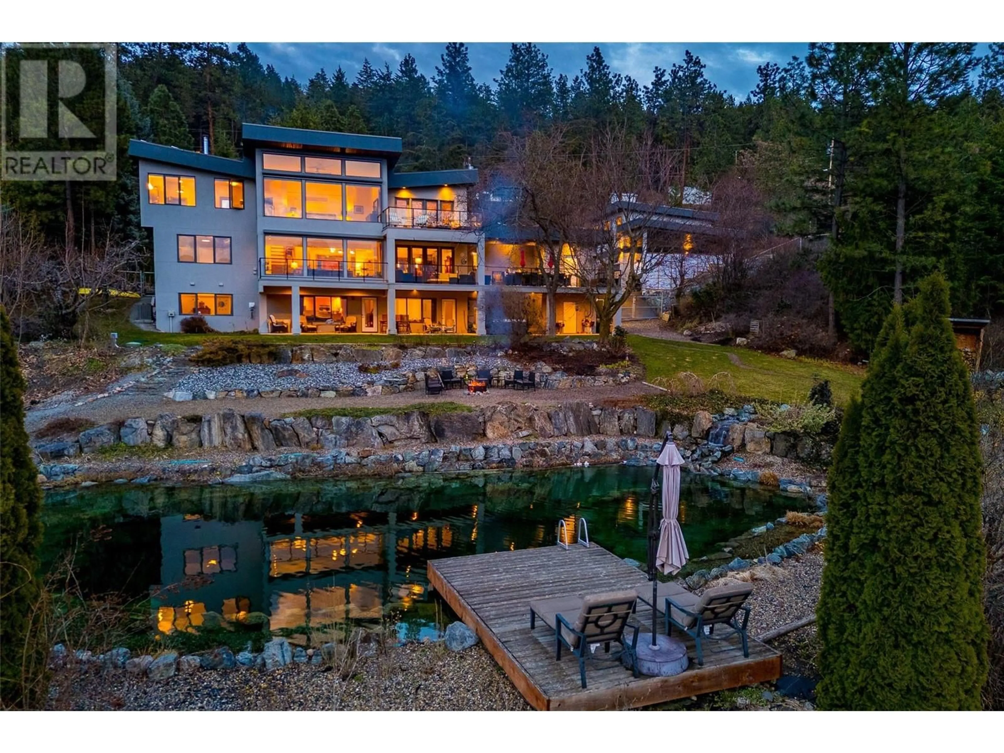 A pic from outside/outdoor area/front of a property/back of a property/a pic from drone, water/lake/river/ocean view for 16550 CARBONNEAU ROAD, Lake Country British Columbia V4V1B3