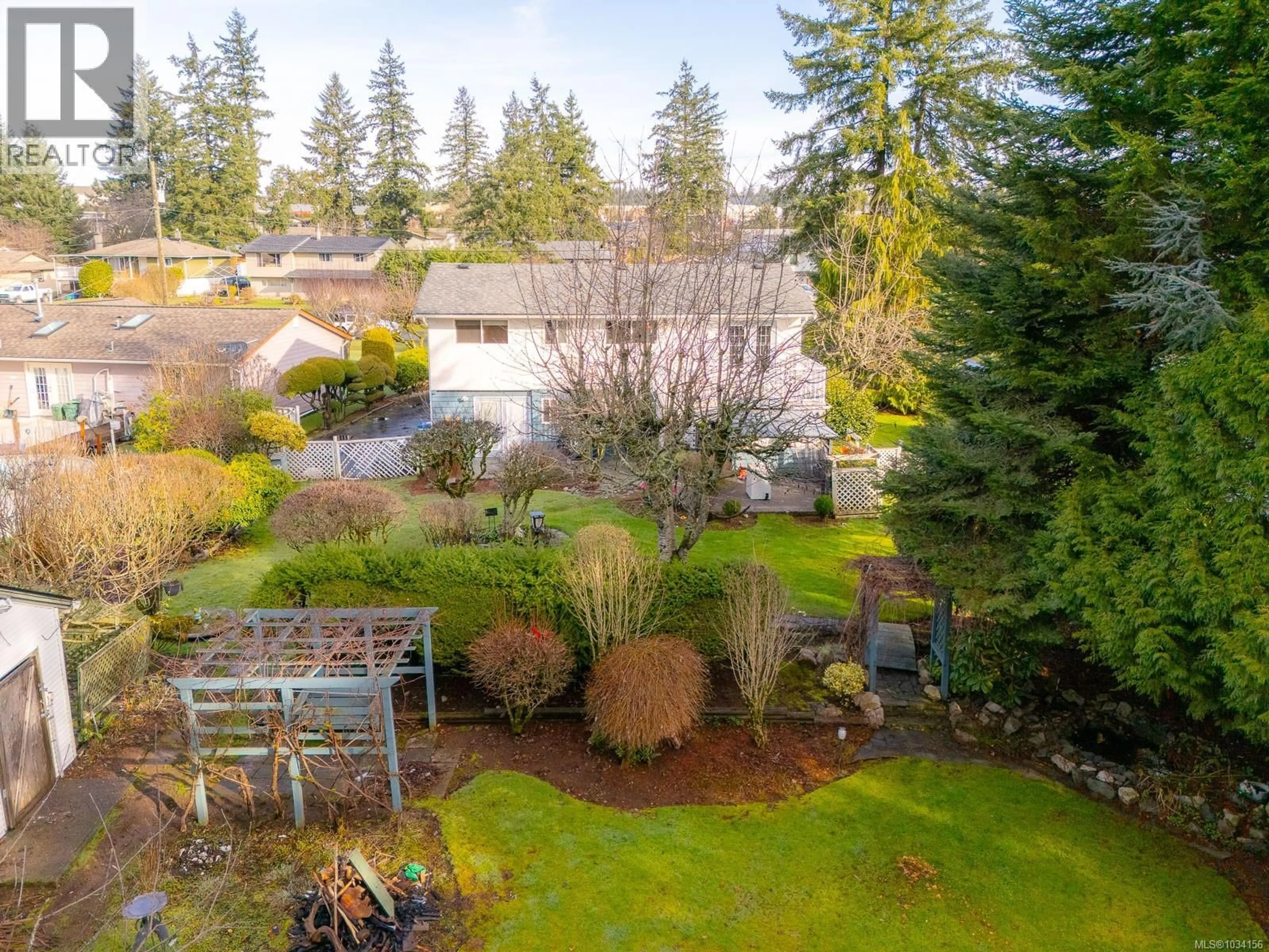 A pic from outside/outdoor area/front of a property/back of a property/a pic from drone, forest/trees view for 5173 SOMERSET DRIVE, Nanaimo British Columbia V9T2K5