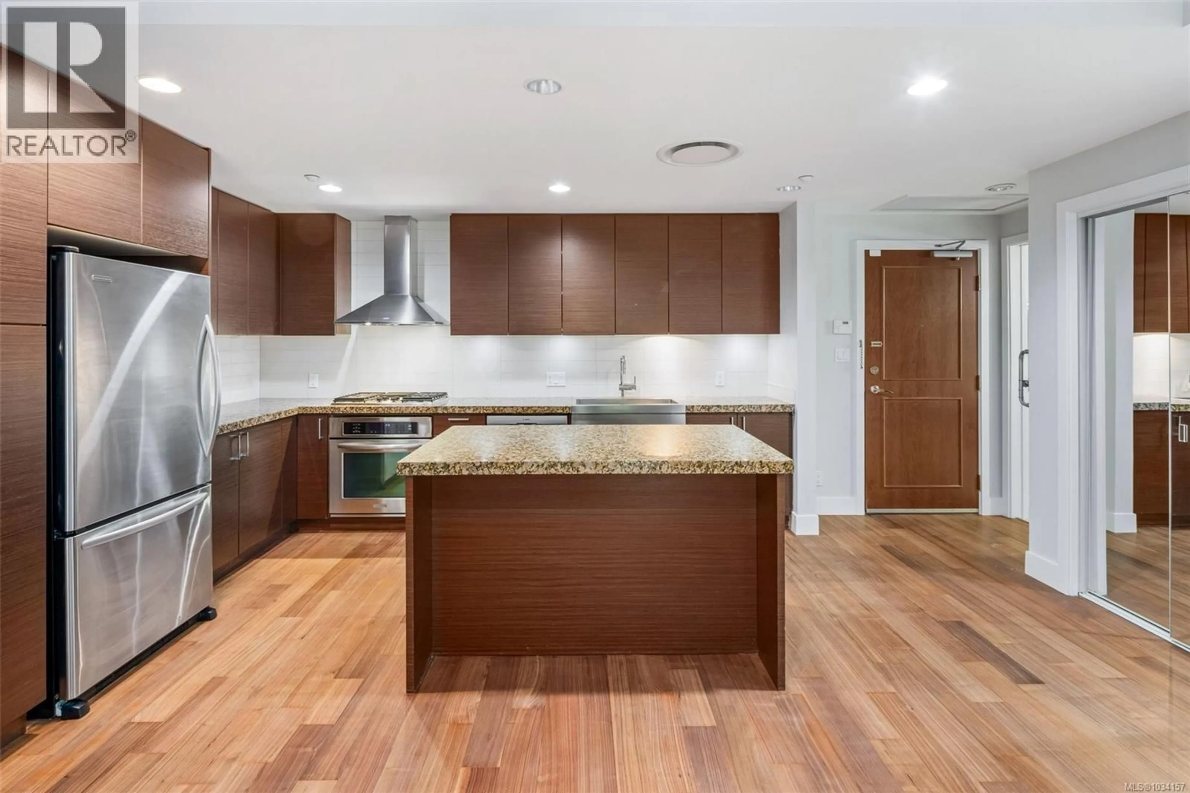 Open concept kitchen, wood/laminate floor for 113 - 1400 LYNBURNE PLACE, Langford British Columbia V9B0A4