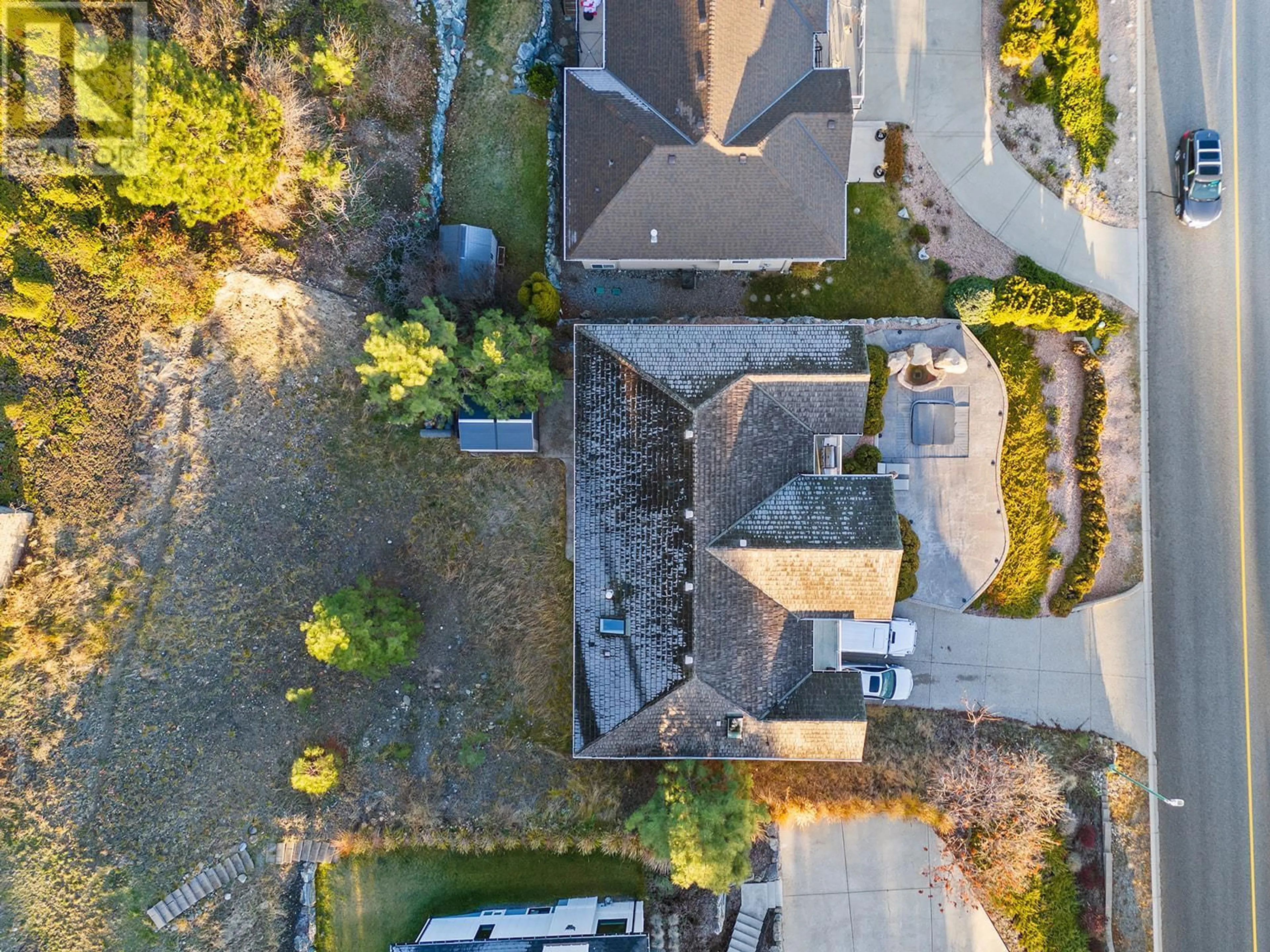A pic from outside/outdoor area/front of a property/back of a property/a pic from drone, street for 1620 MISSION HILL ROAD, West Kelowna British Columbia V4T2M4
