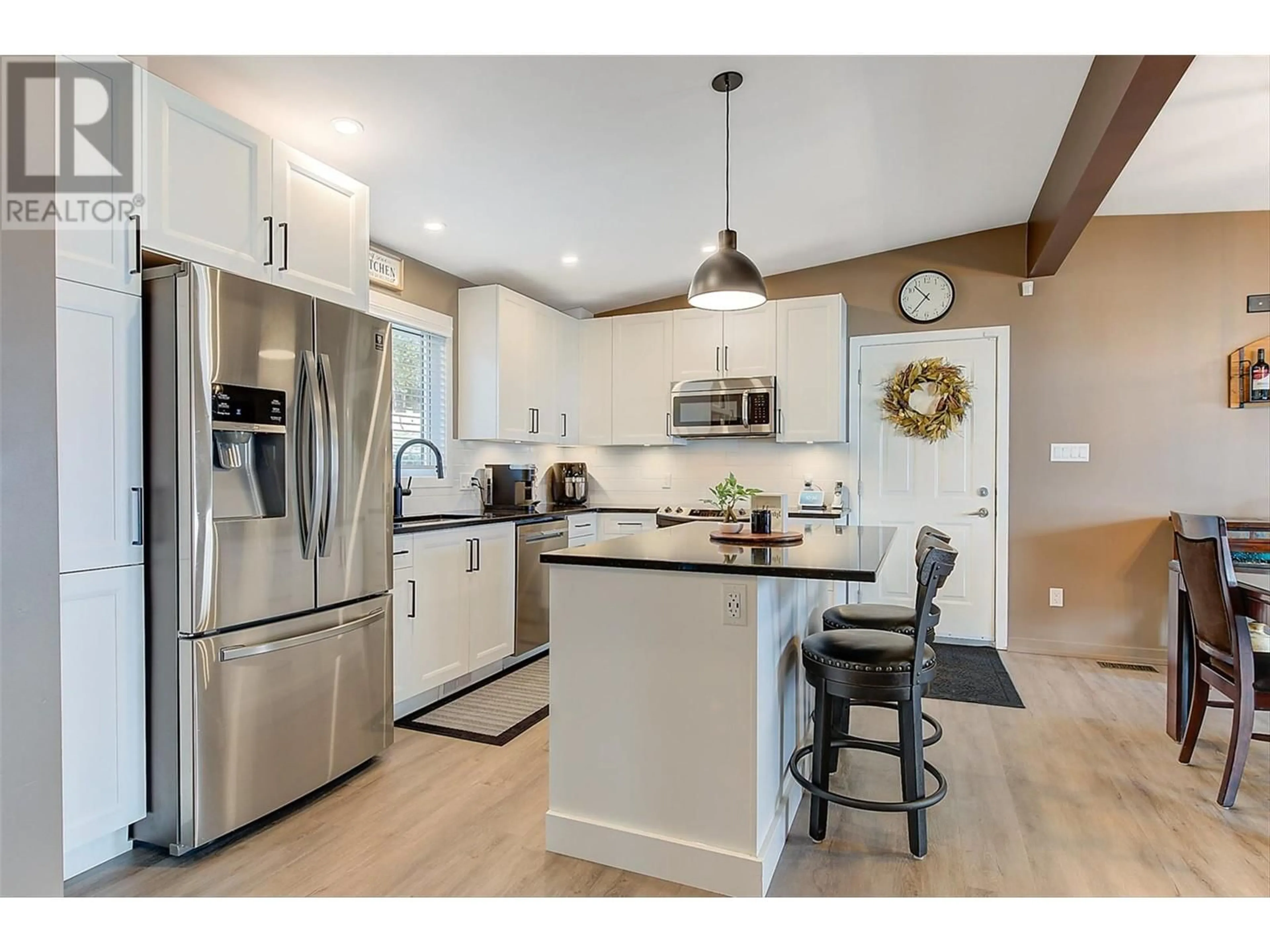 Open concept kitchen, unknown for 4147 PONDEROSA DRIVE, Peachland British Columbia V0H1X5