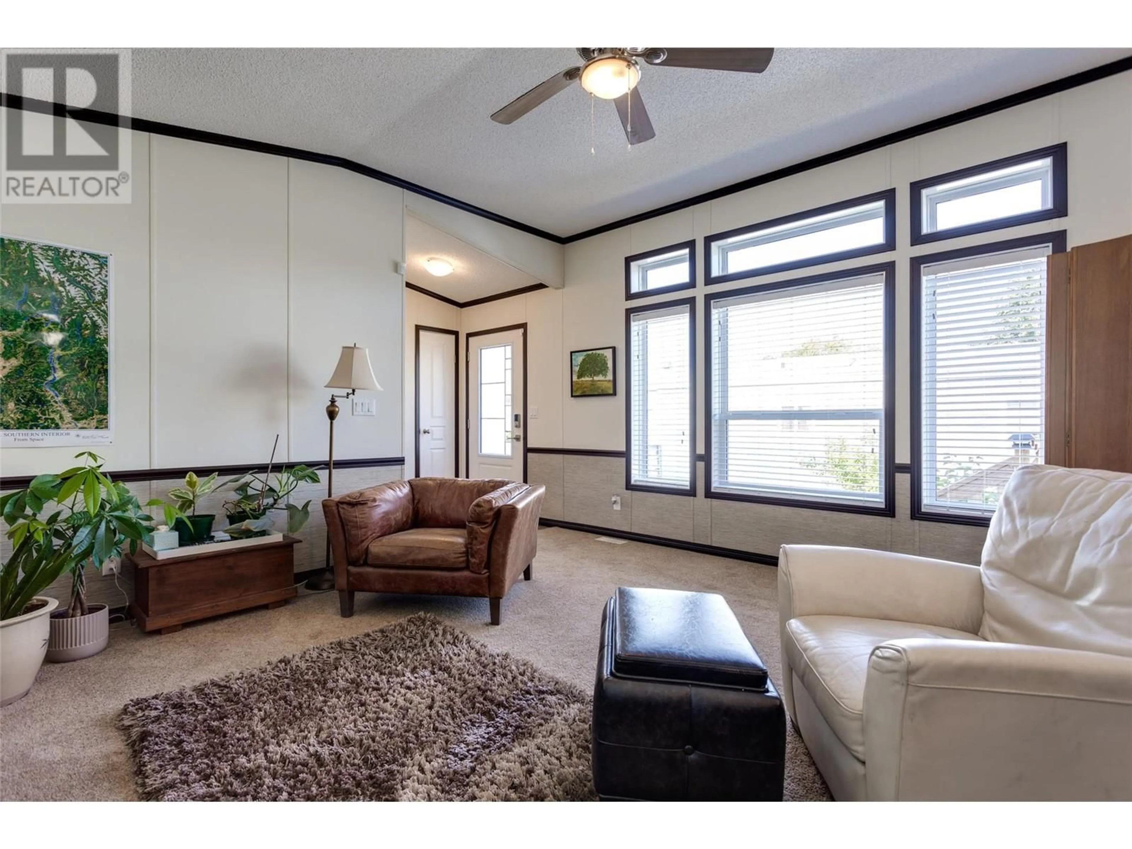 Living room with furniture, unknown for 8 - 3535 MCCULLOCH ROAD, Kelowna British Columbia V1W4R8