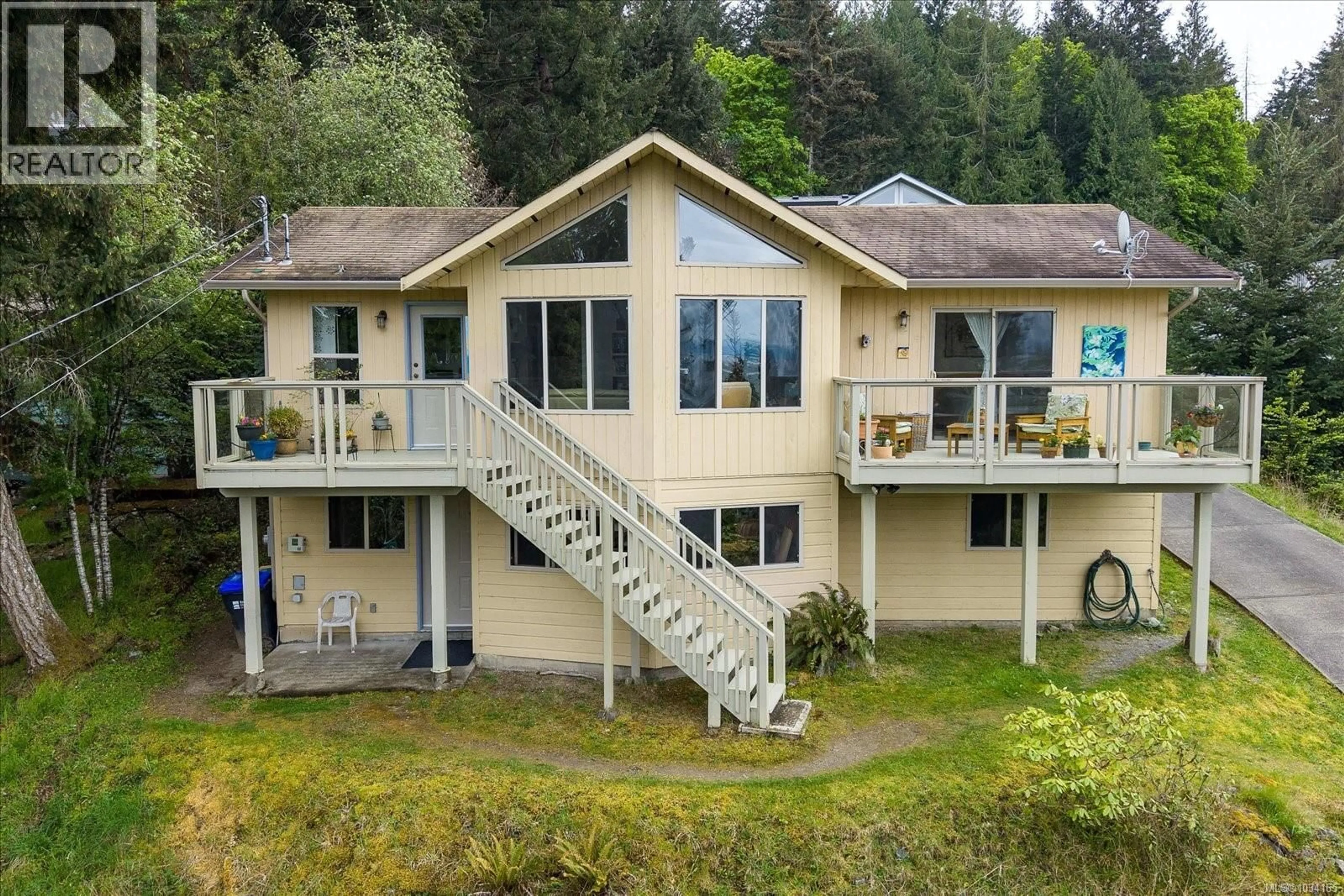 A pic from outside/outdoor area/front of a property/back of a property/a pic from drone, water/lake/river/ocean view for 3122 DOLPHIN DRIVE, Nanoose Bay British Columbia V9P9J2